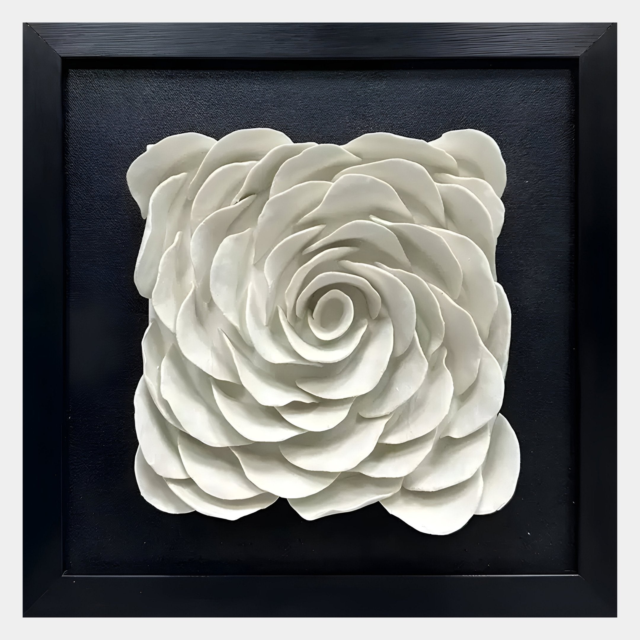 The Harmonia 3D Rose Wall Installation With Black Frame by Giant Sculptures features a layered, dimensional white rose on a black backdrop—a contemporary floral artwork offering bold contrast and sculptural depth.