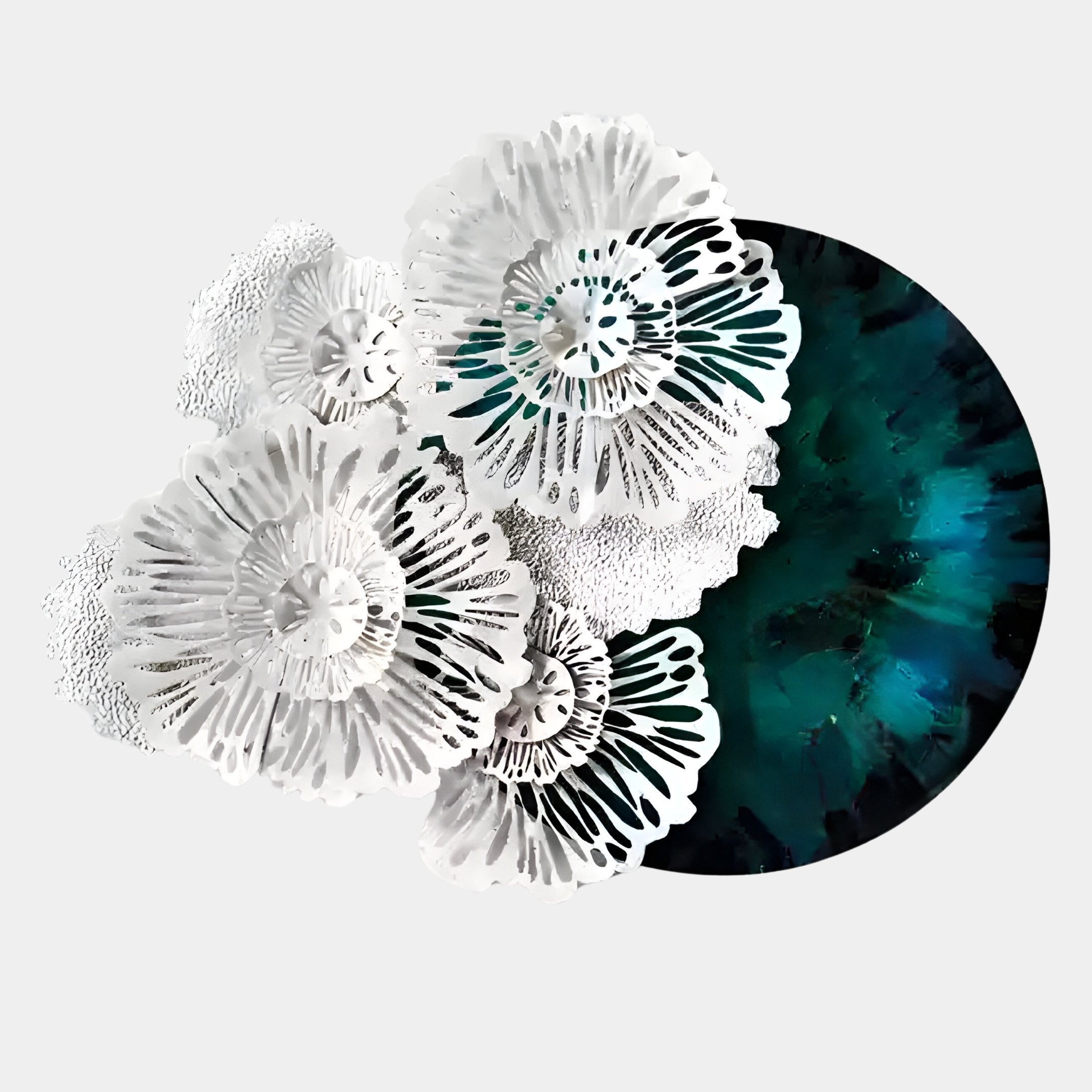 The Aurum Flora White Petals Emerald Metal Wall Art by Giant Sculptures features intricate white floral petals layered over a dark, marbled teal and black background on a light gray surface.
