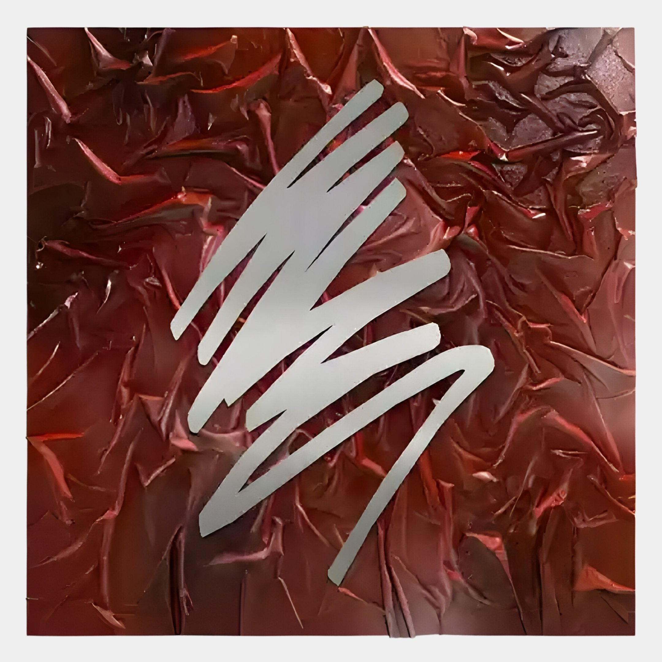 Plisse Crimson Red Textured Abstract Wall Art by Giant Sculptures features a metallic silver zigzag over a crimson red, crumpled background—ideal for adding striking highlights and modern flair to your space.