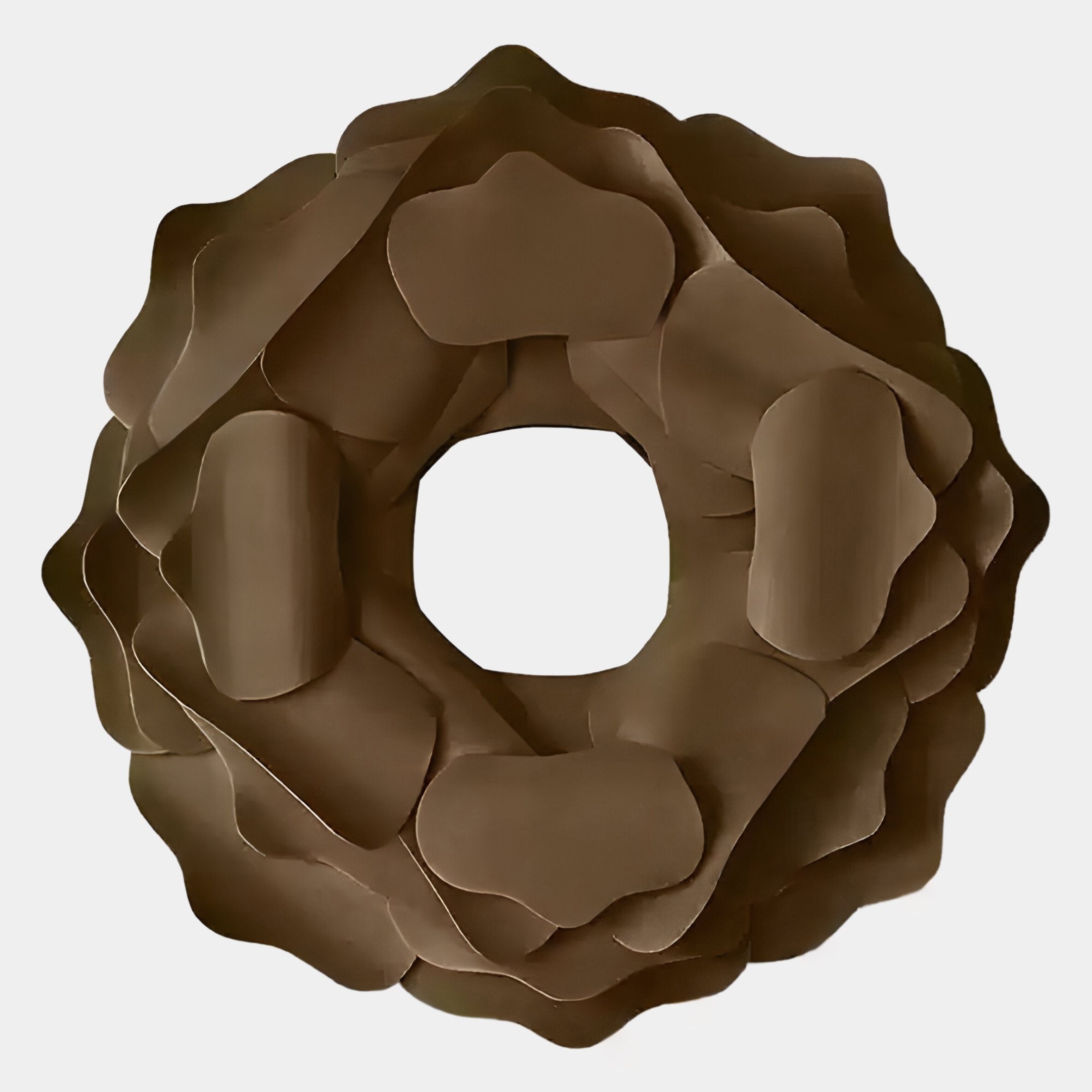 The Sculptura Mirror Sand Beige Floral Round Metal Wall Art by Giant Sculptures features an abstract circular design with overlapping petal-like aluminium in a uniform brown, forming a wreath-like shape against a plain white background.