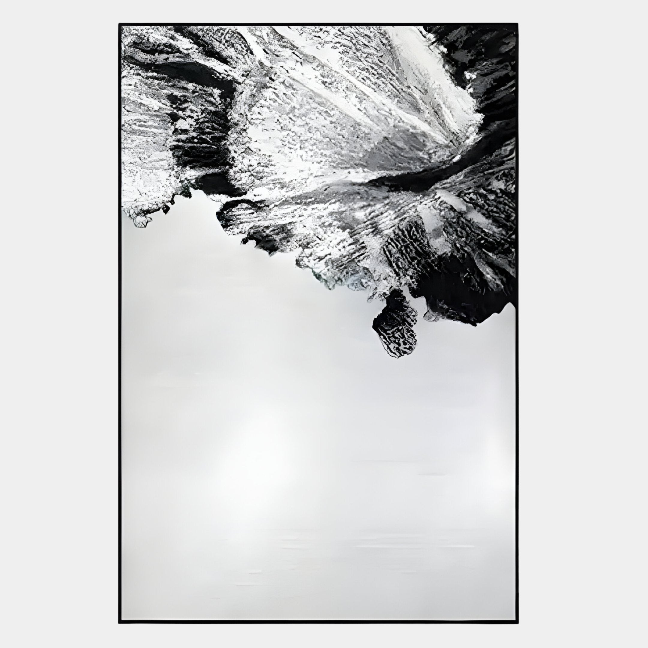Terranica Monochrome Flow Textured Abstract Metal Wall Art by Giant Sculptures features bold, rocky black-and-white brushstrokes fading into a smooth gray background—ideal for contemporary, minimalist spaces.