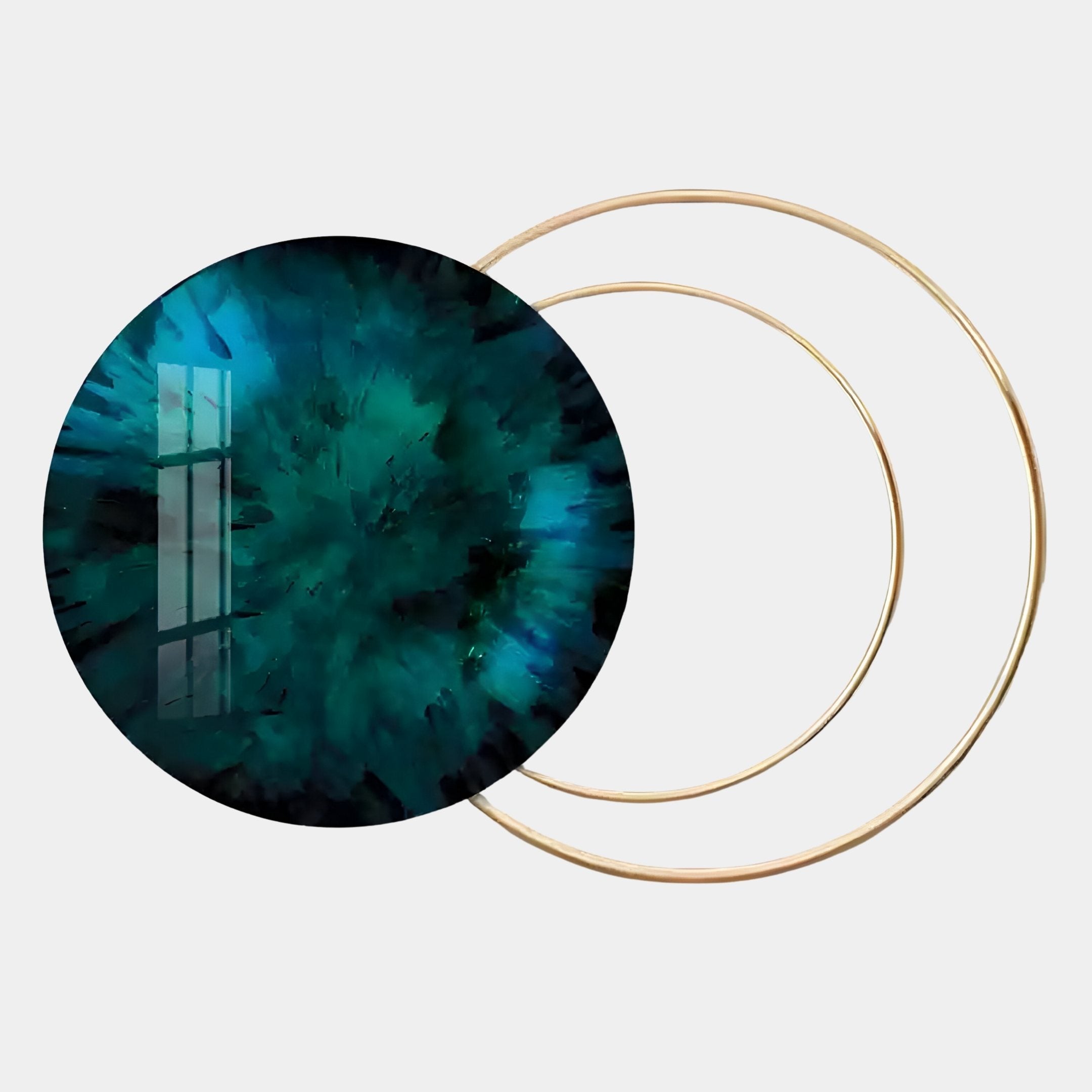 The Eclipse Luxe Emerald Circular Ring Wall Art by Giant Sculptures showcases a glossy, dark teal abstract design with a reflected window, overlapping slim gold circles on a light backdrop—modern elegance redefined.