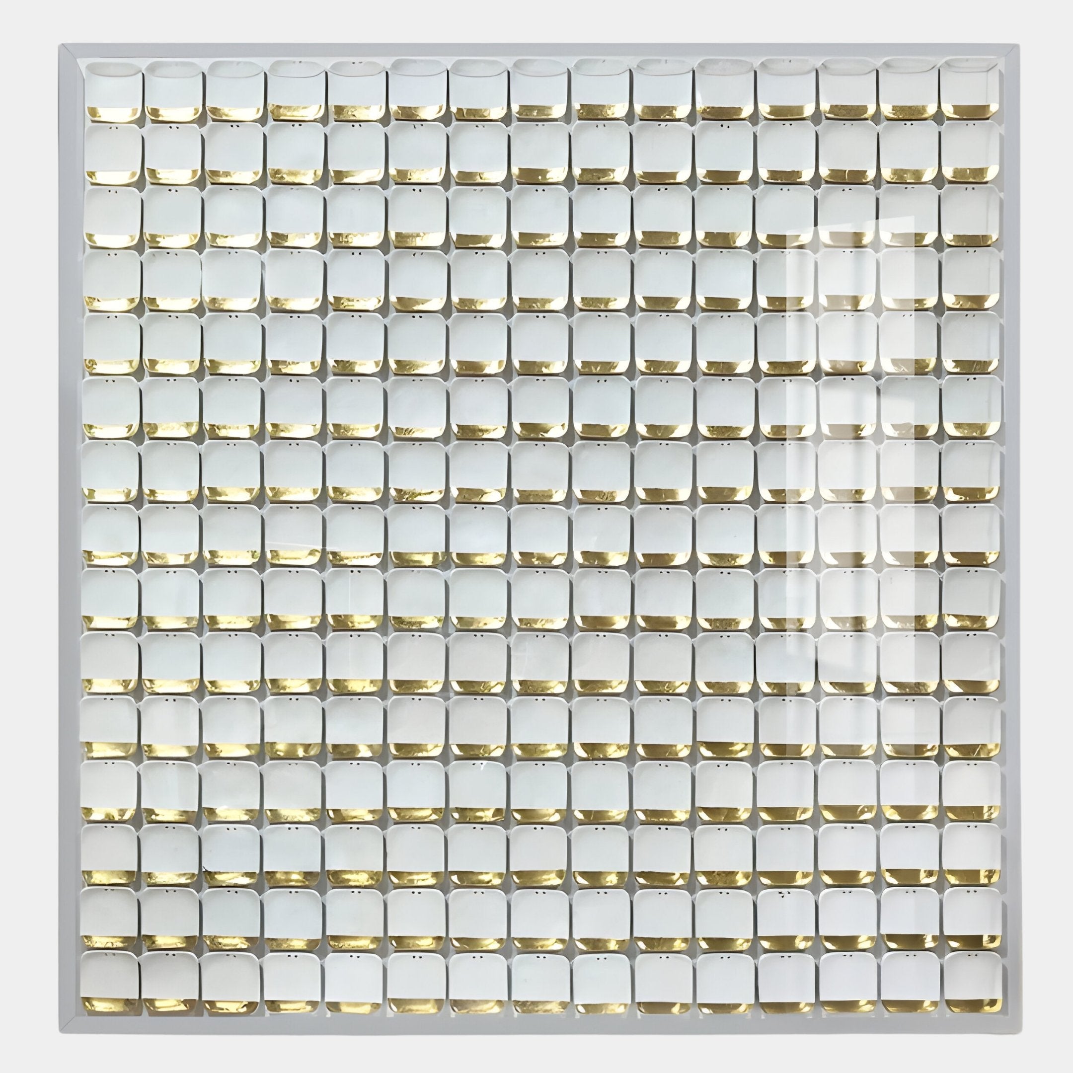 The Lyselle 3D Ceramic Wall Art With Hand-Applied Gold Foil Accents by Giant Sculptures features shiny, gold-accented ceramic squares in a precise grid, creating a striking geometric look on a white background.