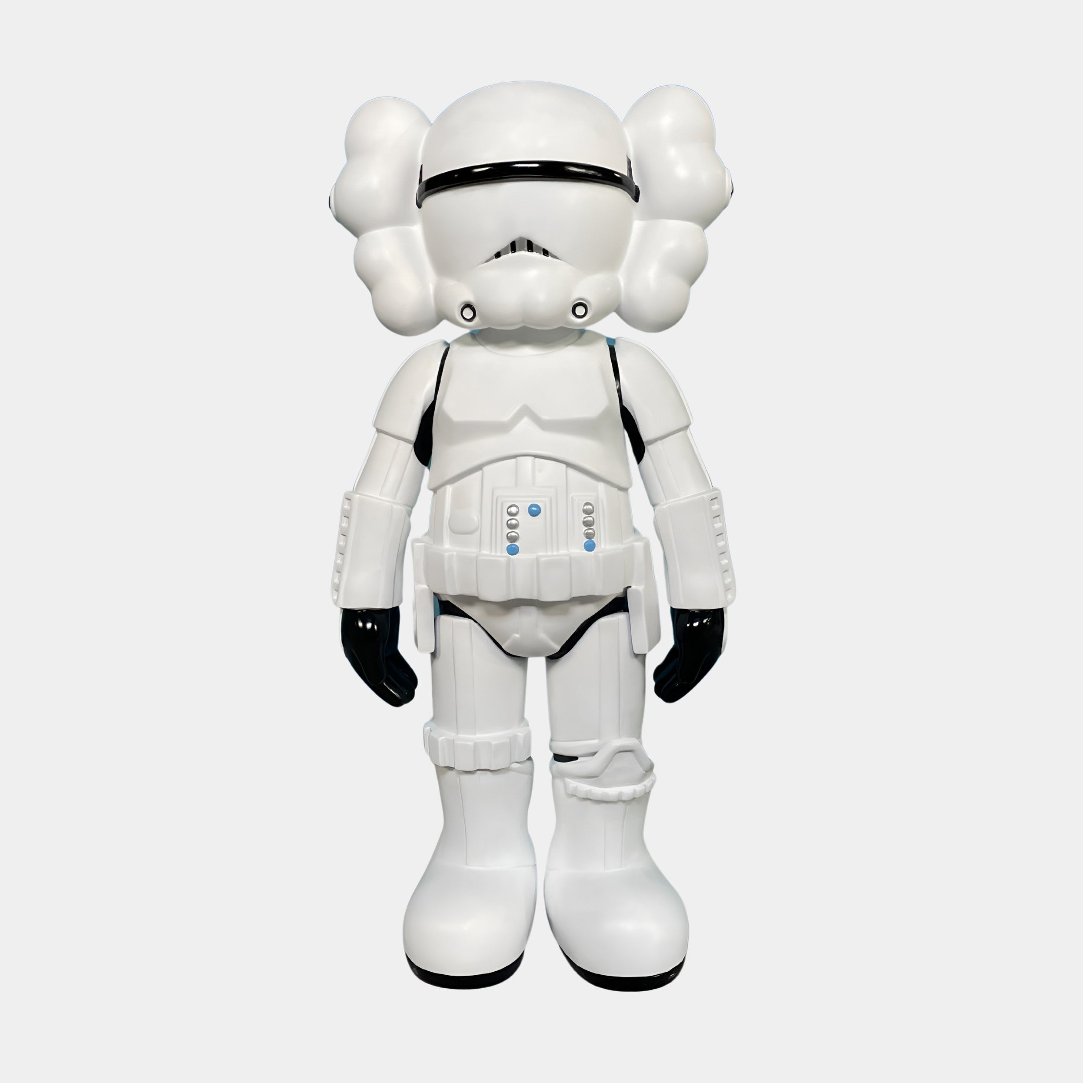 The Black & White Iconify Enforcer Figure - 26cm by Giant Sculptures features a white, minimalist Stormtrooper-inspired design with oversized hands, feet, and head—ideal for contemporary art collections.