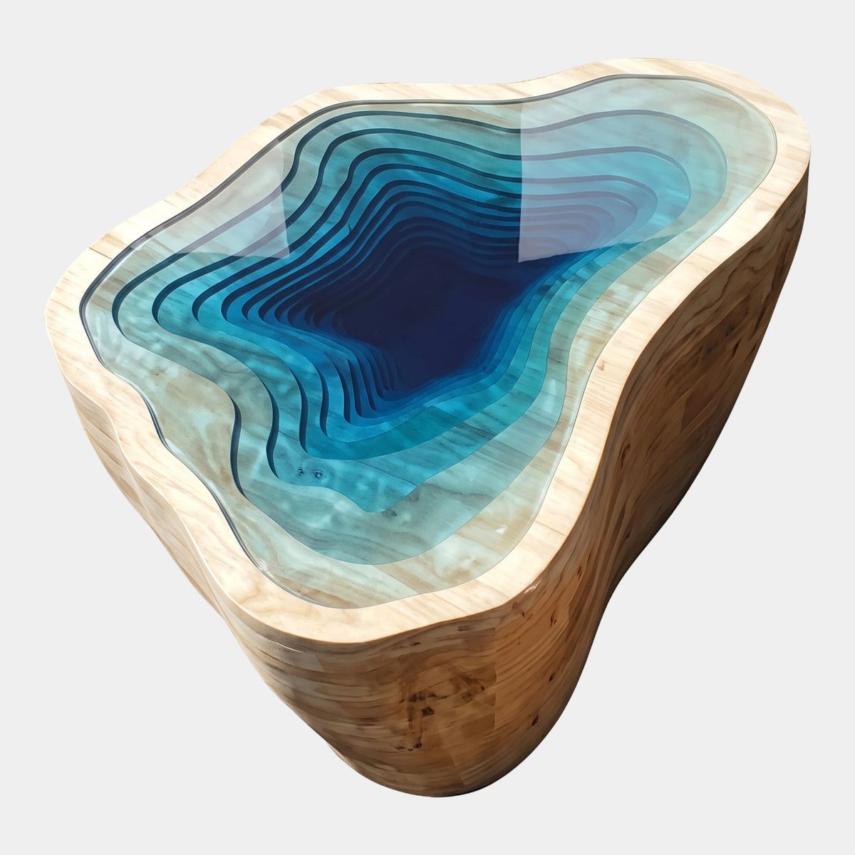 Blue Terraced Lagoon Resin & Wood Drum Table, 88cm, with a pale timber rim surrounding stepped turquoise-to-navy resin terraces, shown on a plain white background.