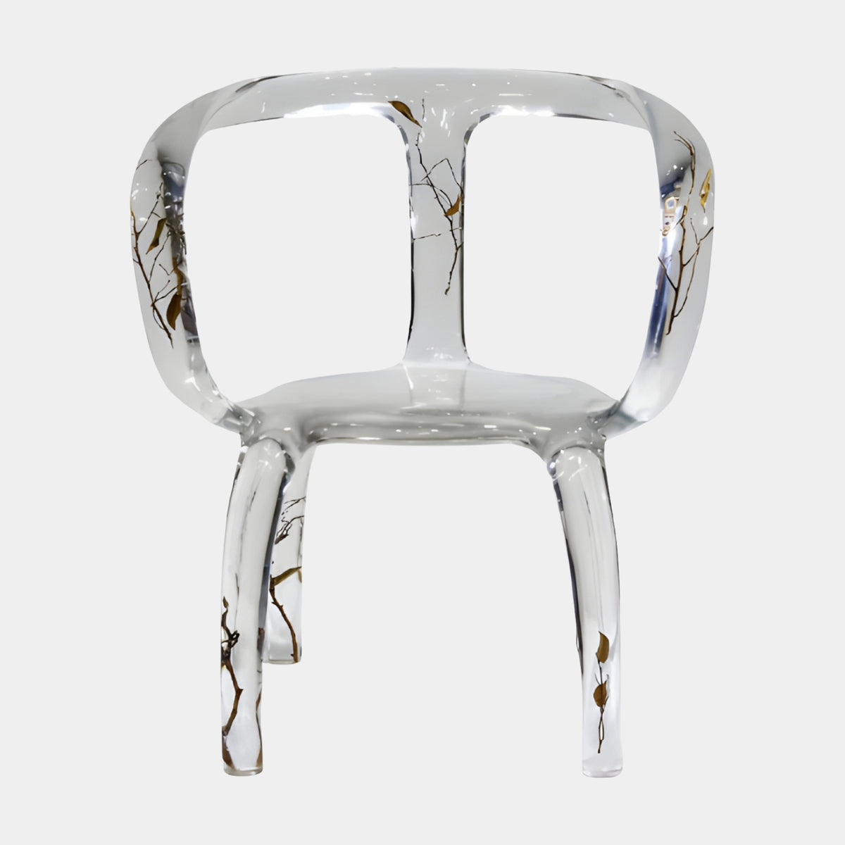 Clear Embedded Twig Cast Resin Tub Chair - 90cm by Giant Sculptures, front view showing bare brown twigs cast within the clear resin shell, legs, and arms, on a plain white background.