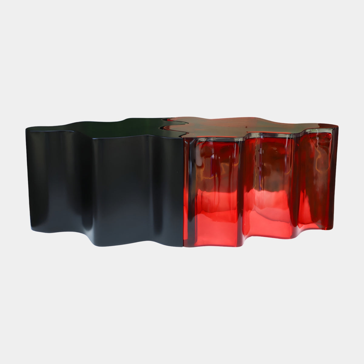 Black to Red Wave Outline Cast Resin Low Table, 120cm, matt black and glossy translucent red sections joined along a wavy edge, on a plain white background.