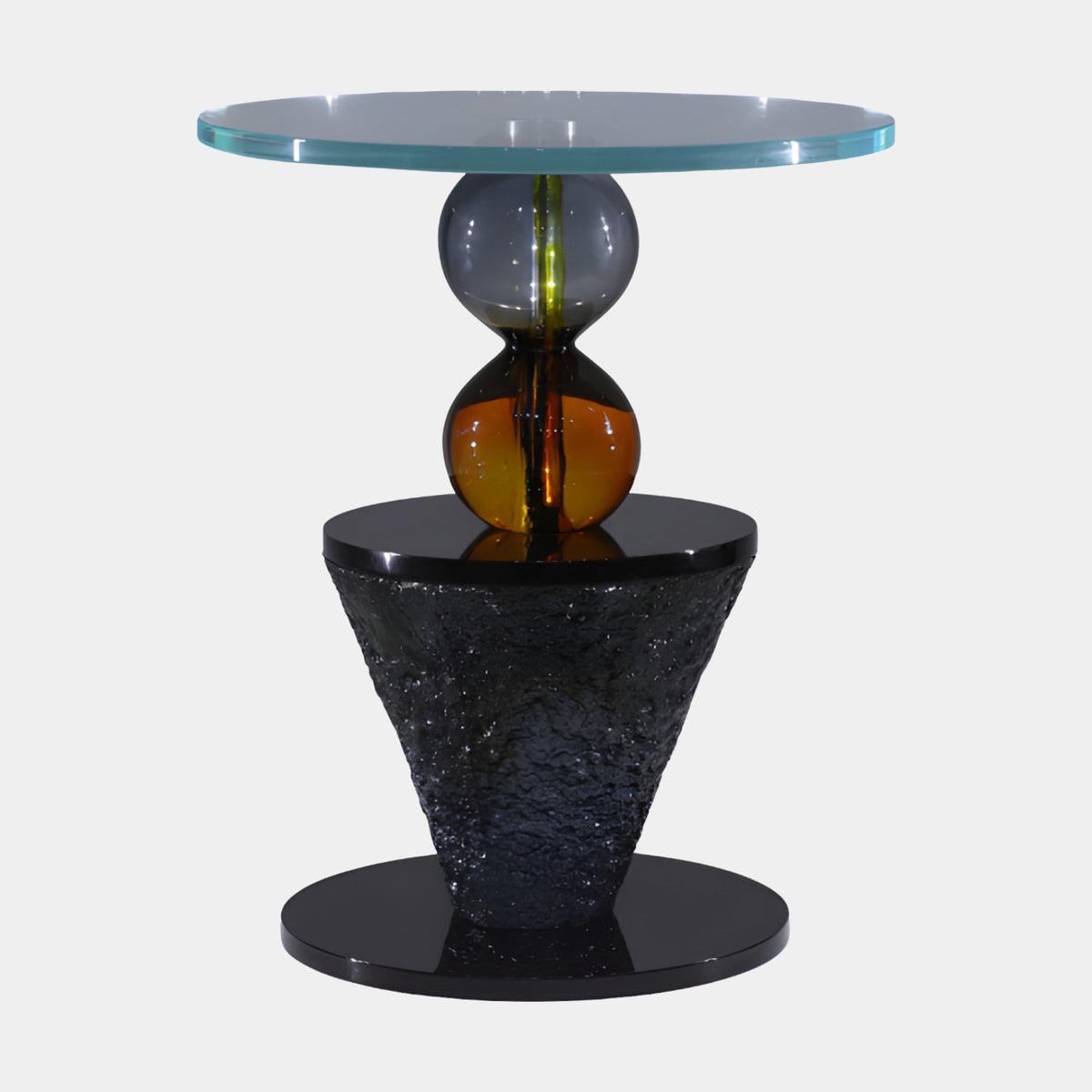 Black Cone Stacked Sphere Glass Top Side Table (50cm) with smoked grey and amber resin spheres on a textured black cone base and disc, shown on a plain white background.