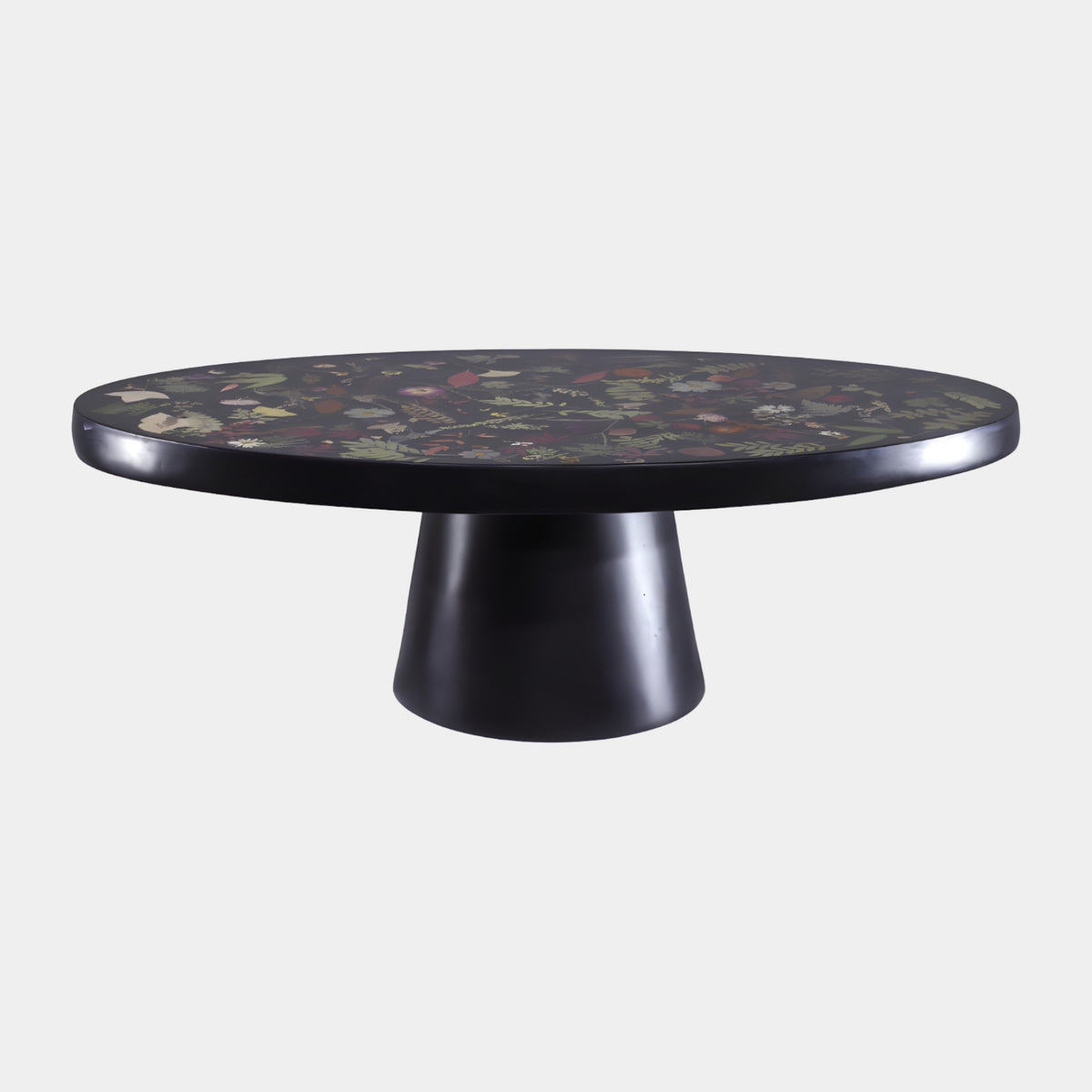 Botanical Inlay Black Rim Cast Resin Low Table, 120cm, with pressed flowers and leaves under a black rim on a cone base, shown on a plain background.