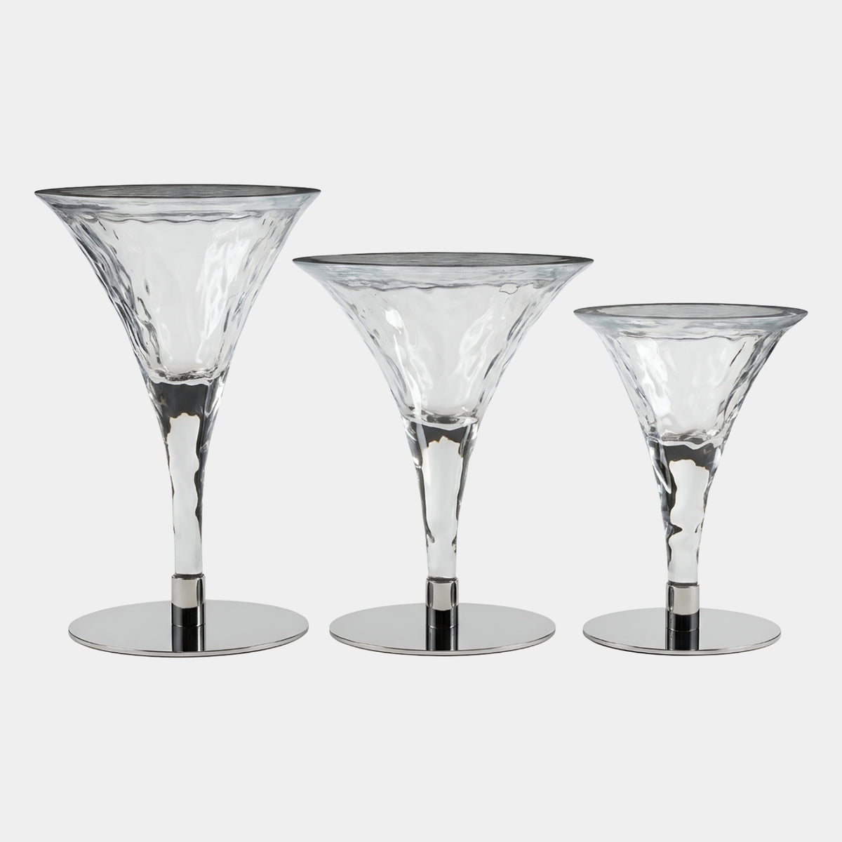 Clear Cocktail Glass Resin & Metal Pedestal Tables by Giant Sculptures in three heights (82/92/102cm), hammered resin cones on mirror-polished metal bases, plain white background.