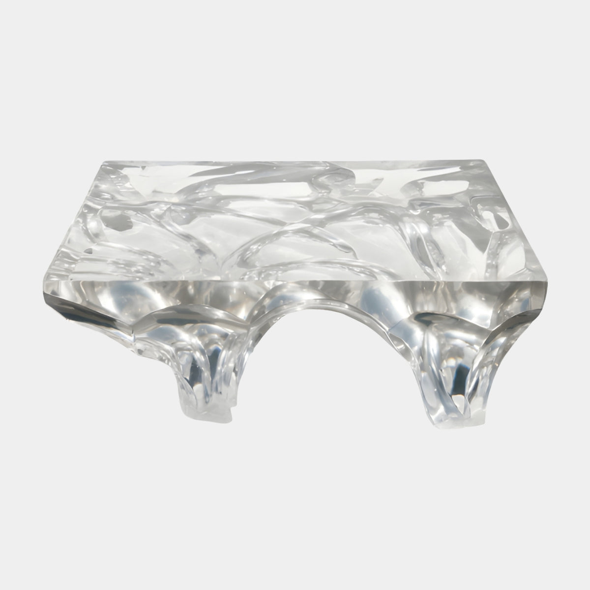 Clear Arched Base Relief Top Cast Resin Low Table, 110cm, with a textured clear resin slab on dripping arched legs, shown on a plain light background.