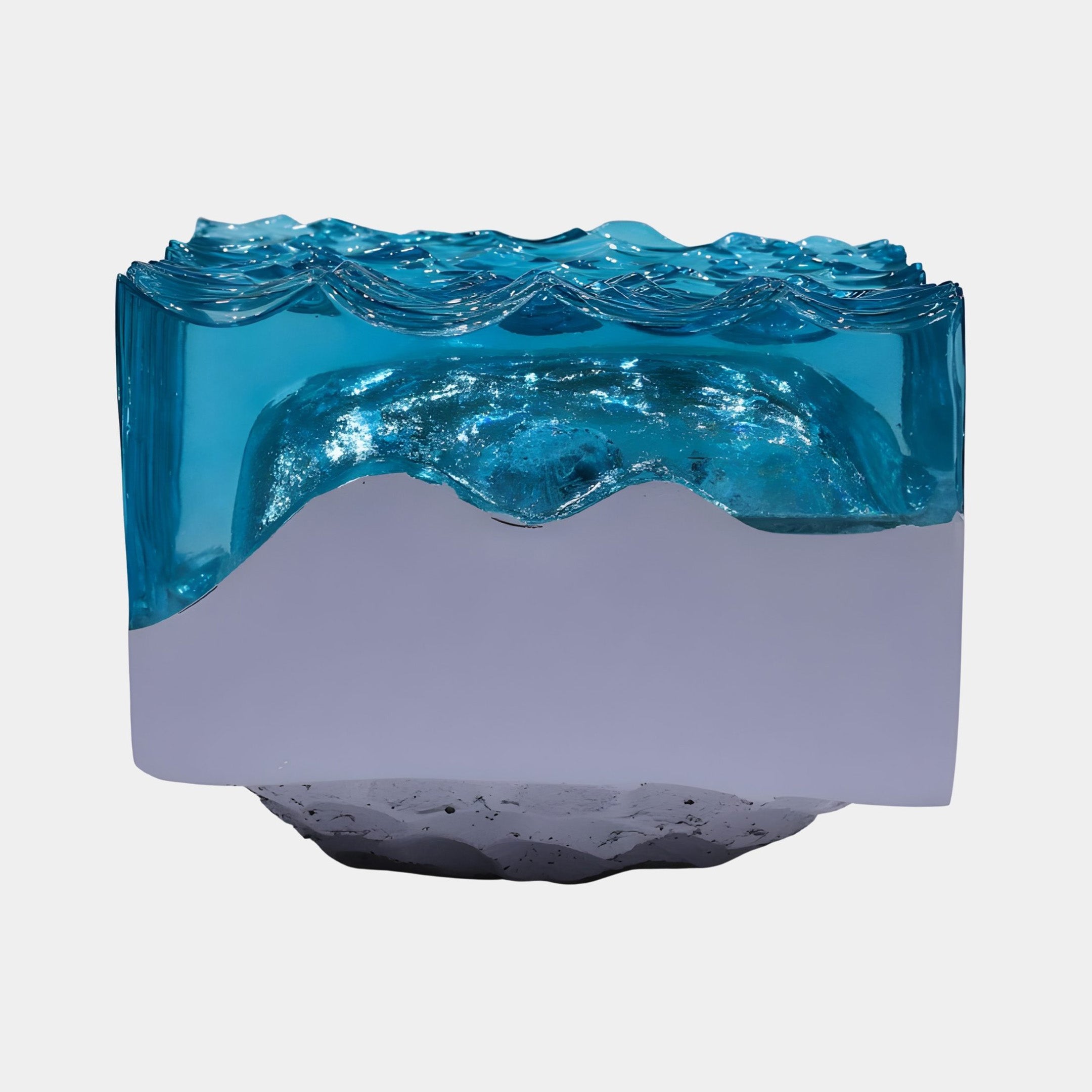 Blue Rippled Ocean Surface Mountain Block resin sculpture by Giant Sculptures, showing translucent turquoise waves over a pale sculpted peak on a light background.
