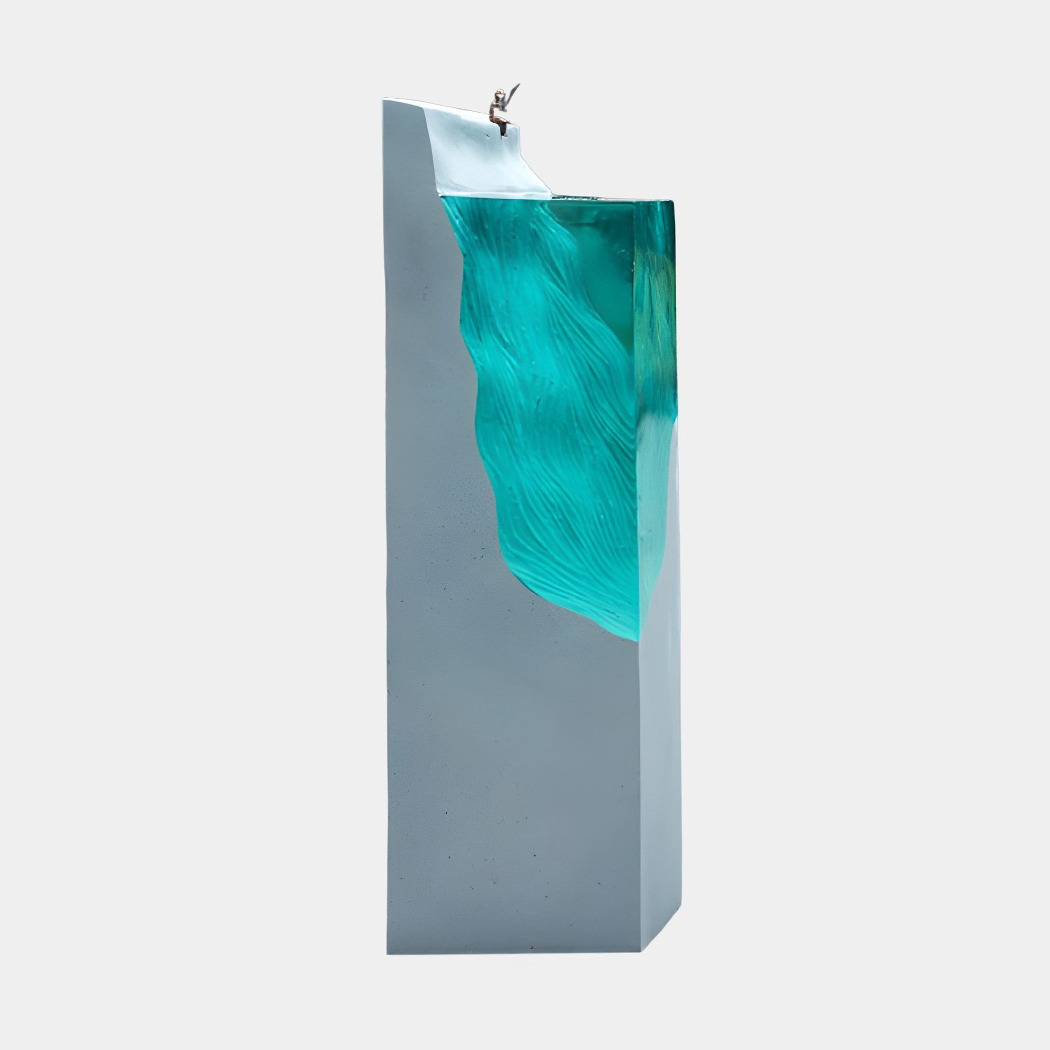 Giant Sculptures' 120cm Teal Resin Wave and Bronze Fisherman Sculpture, showing a tall fibreglass column with a flowing teal wave and tiny figure at the top.