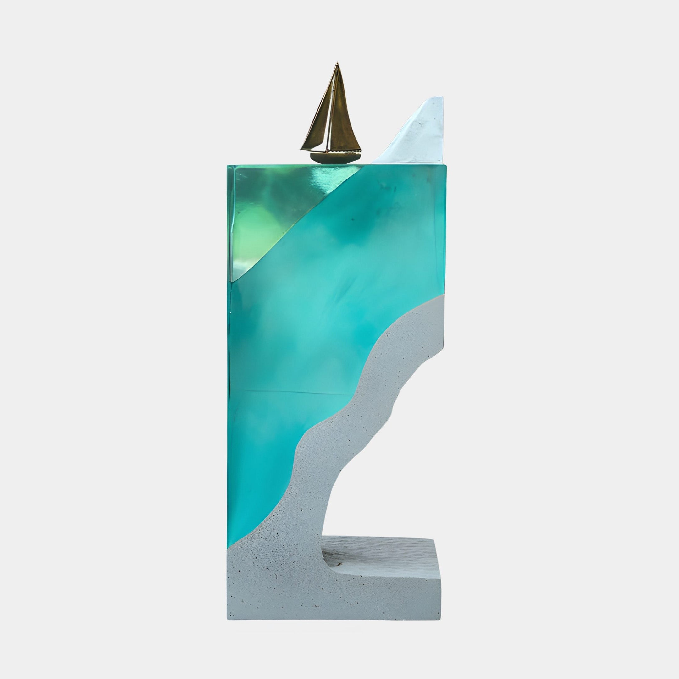 Giant Sculptures Clear Resin Mountain River Scene Sculpture 125cm, a teal resin block with a wave form, gold sailboat on top and grey base, on white.