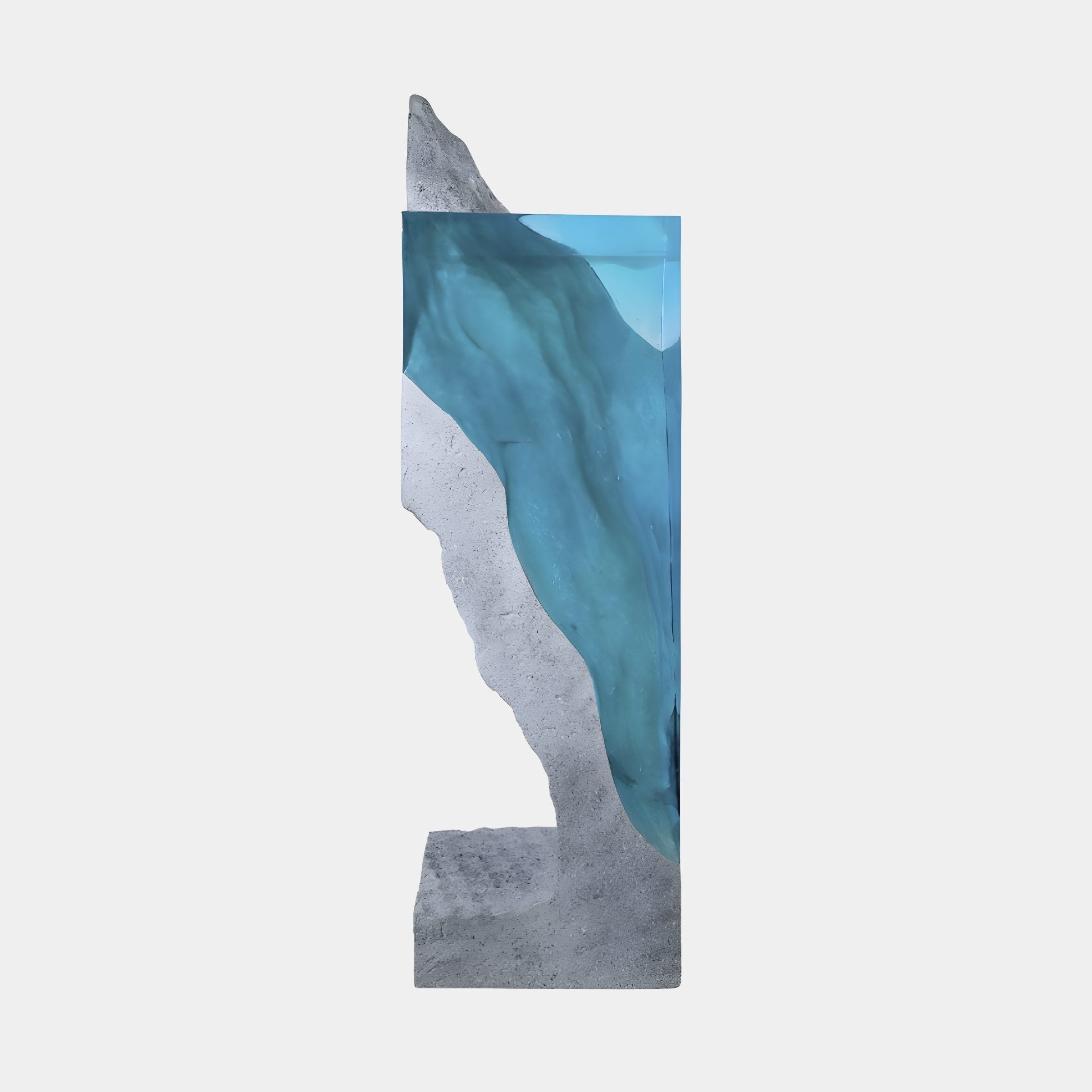 Teal Resin Tidal Wave Column Sculpture by Giant Sculptures, 135cm, shown from the side with luminous blue resin flowing down a grey-white textured base on a plain background.