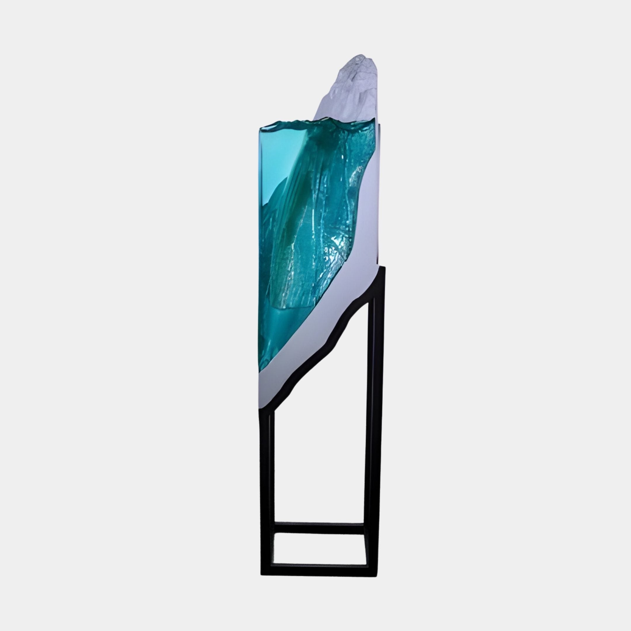 Giant Sculptures Teal Resin Wave Panel rising 132cm with a turquoise cresting wave above a white base, held in a slim black steel stand on a plain background.