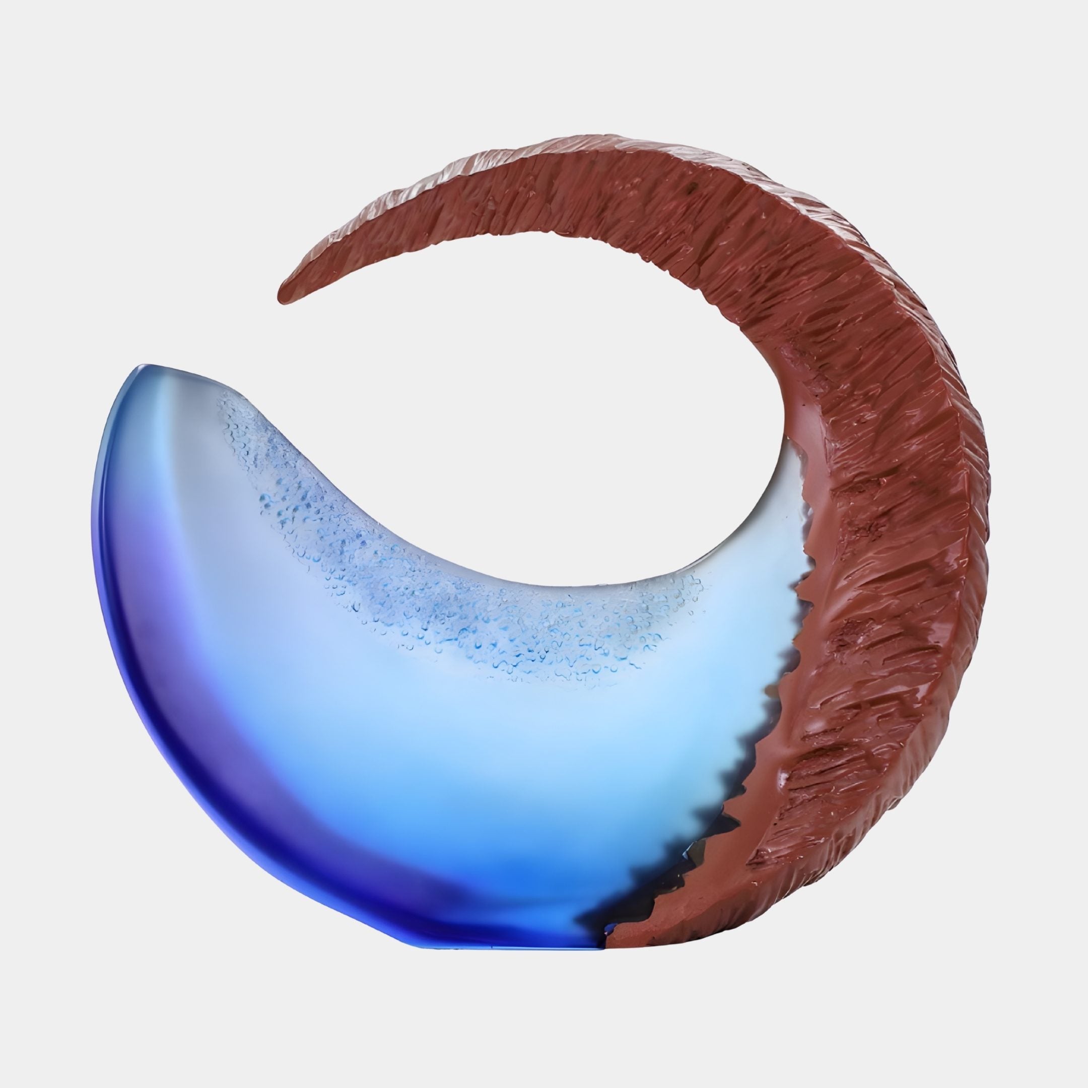 Blue and brown frosted crescent resin sculpture by Giant Sculptures, pairing a translucent blue wave with a textured bark-like brown rim on a white background.