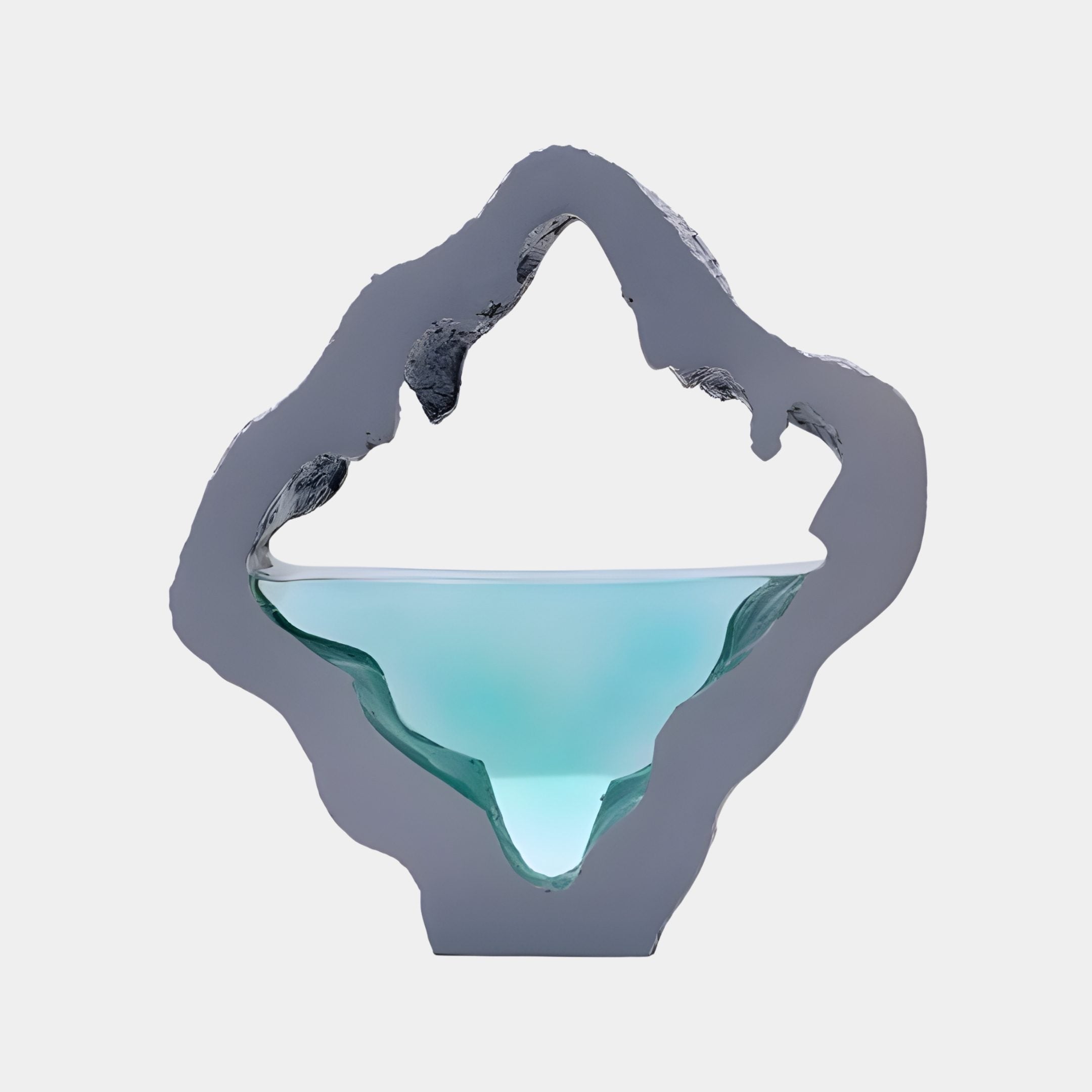 Giant Sculptures Teal Resin Inlay Grey Mountain Silhouette Sculpture, 25cm, with a glowing turquoise pool set inside a grey peak, on a pale background.