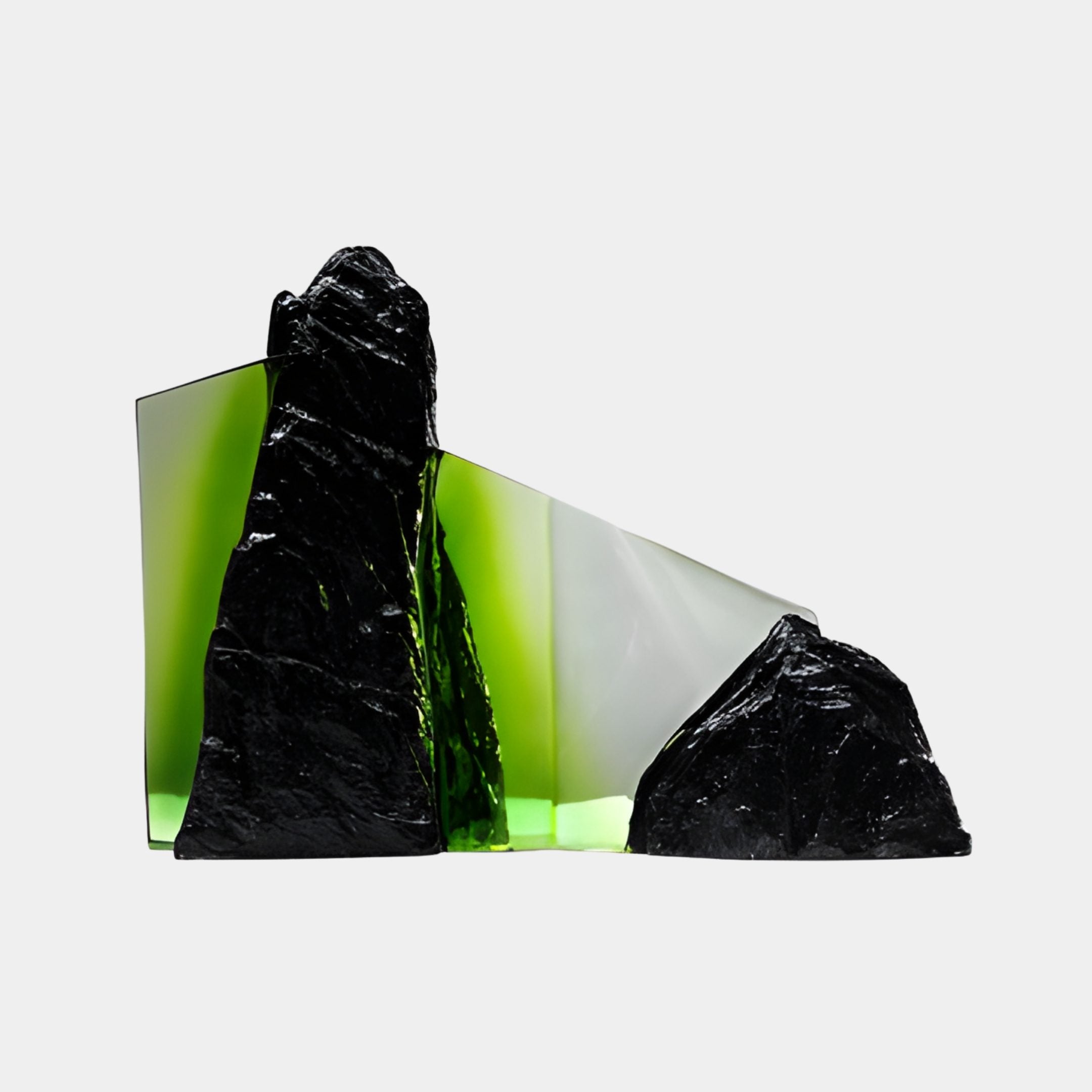Black Rock Column with Green Resin Sculpture by Giant Sculptures, featuring jagged charcoal stone forms split by a luminous green resin seam, on a plain background.