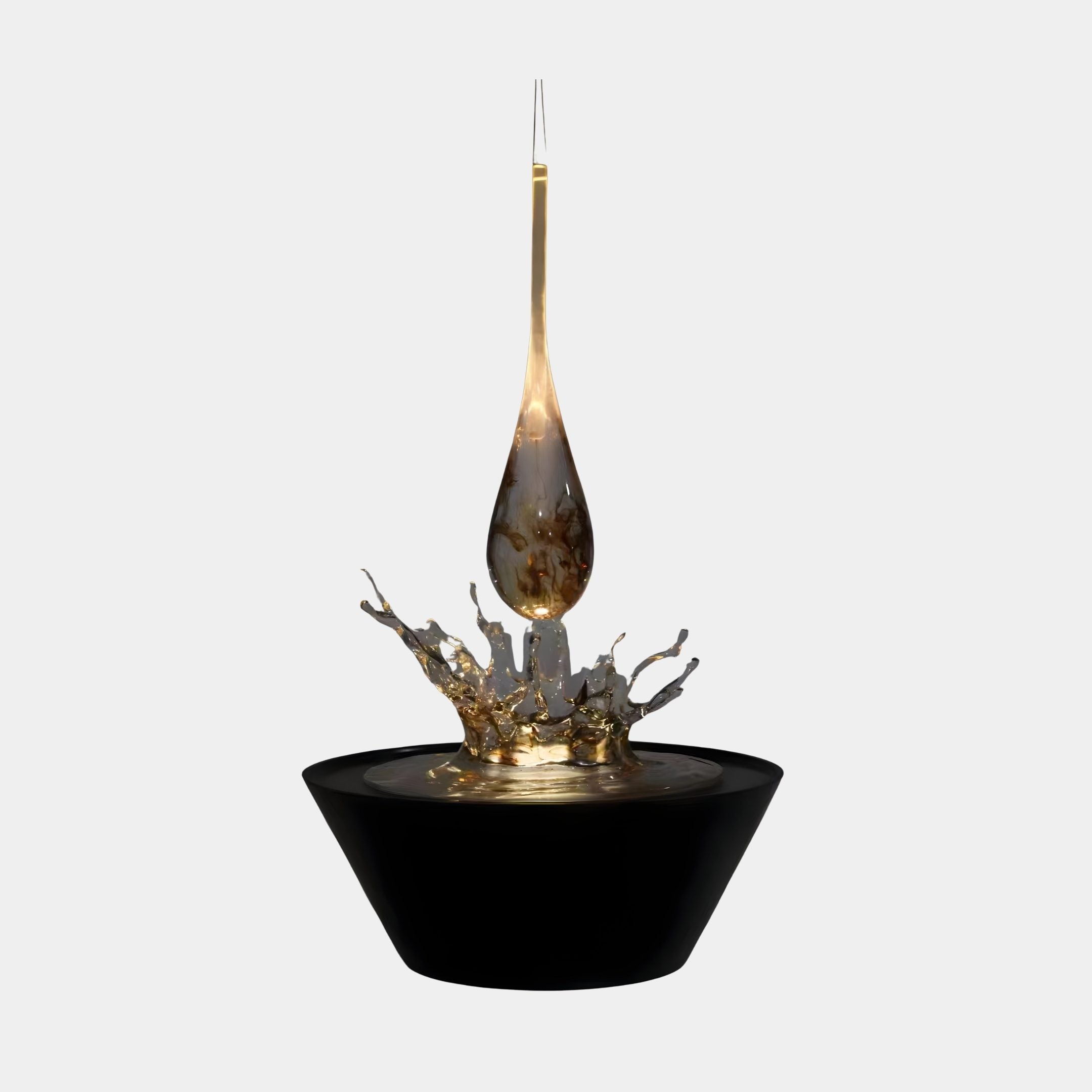 Amber Glow Floating Water Drop Resin Splash Sculpture by Giant Sculptures, with a suspended teardrop above a gilded splash crown and glossy black bowl.