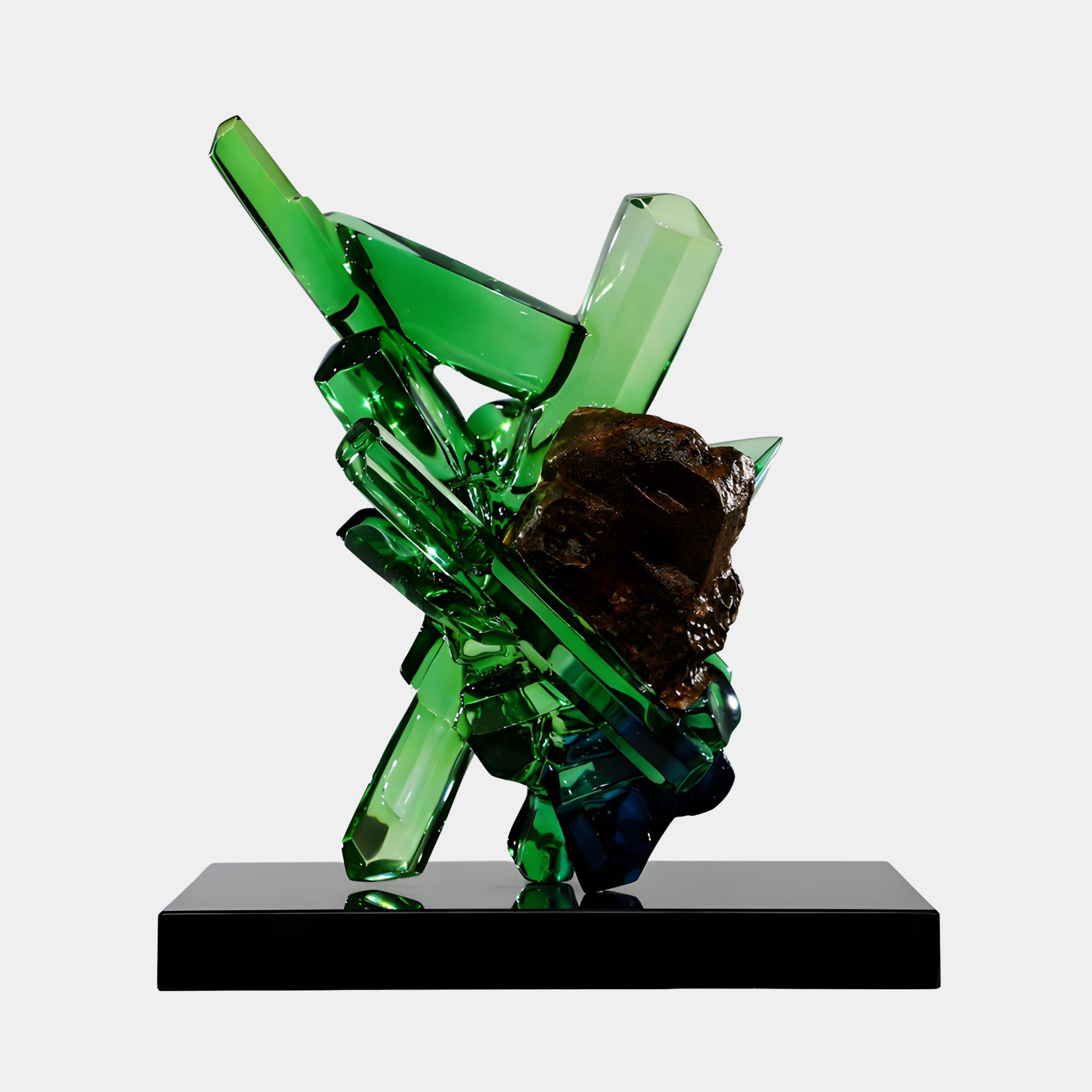 Green Geometric Crystal Cluster Rock Resin Sculpture by Giant Sculptures, featuring faceted emerald shards rising from a bronzed rock on a black plinth.