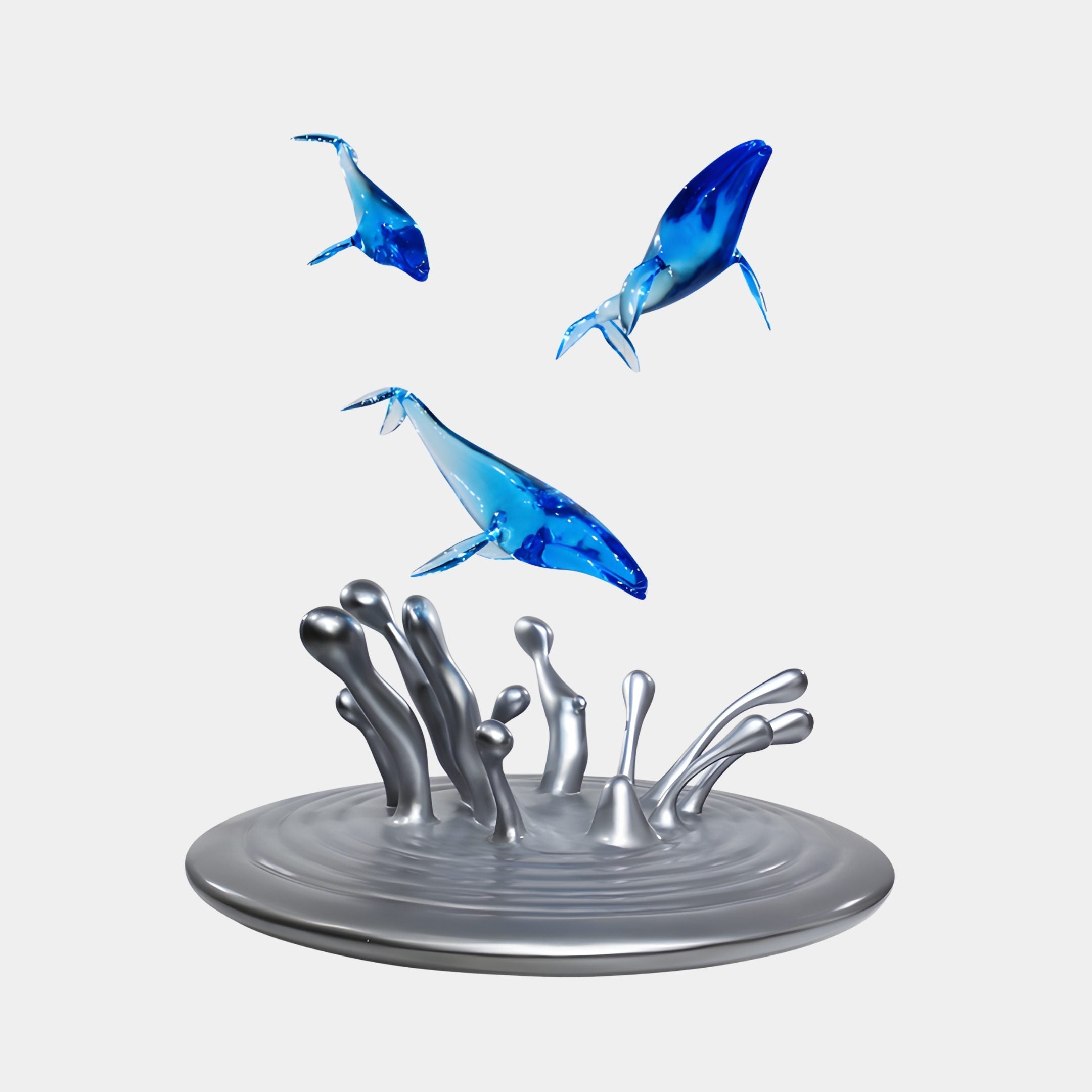 Clear Blue Humpback Whale Aquatic Resin Sculpture by Giant Sculptures, three translucent blue whales leaping above a silver splash base on a plain background.