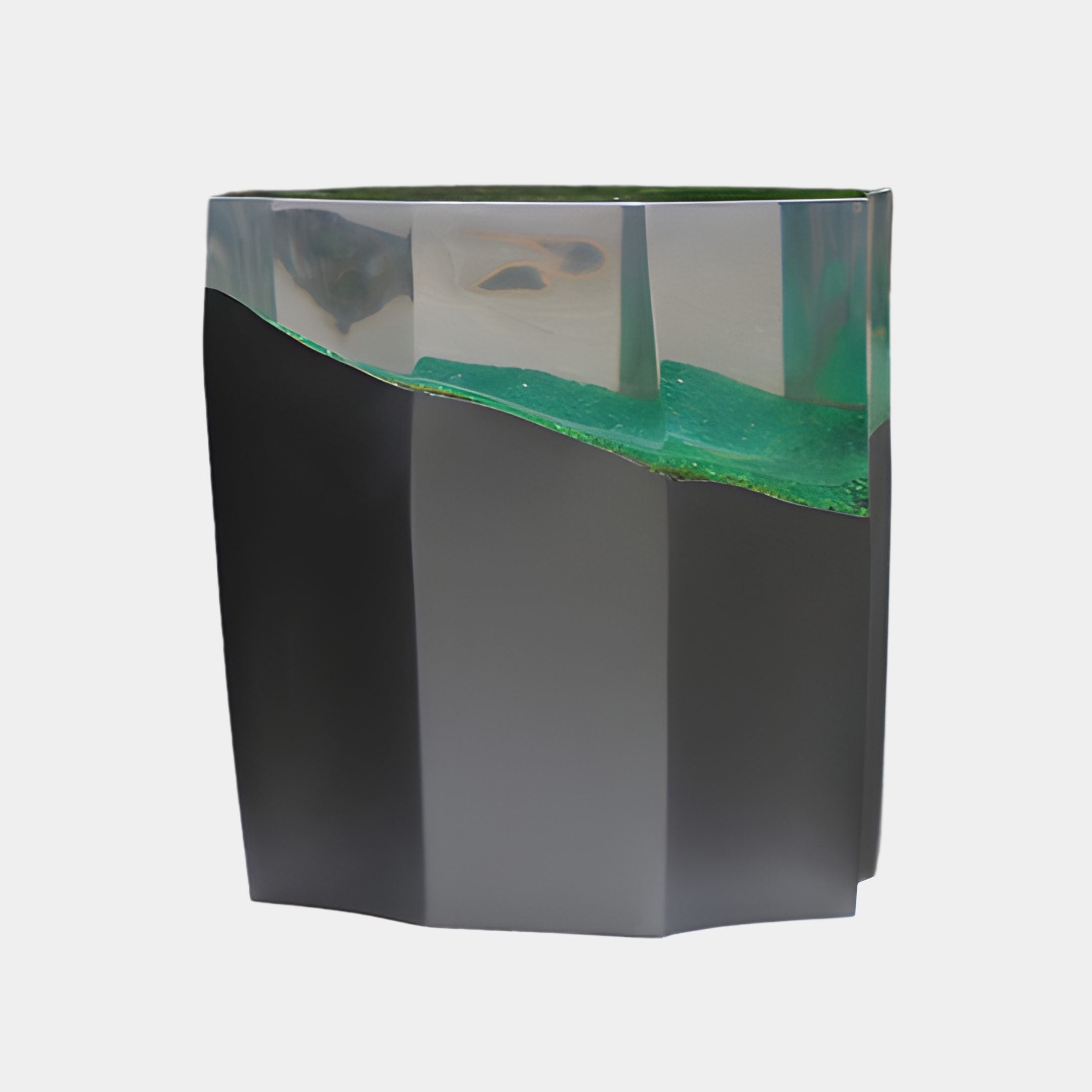 Faceted charcoal-grey block sculpture by Giant Sculptures topped with a translucent resin crown featuring teal-green wisps, shown against a plain white background.