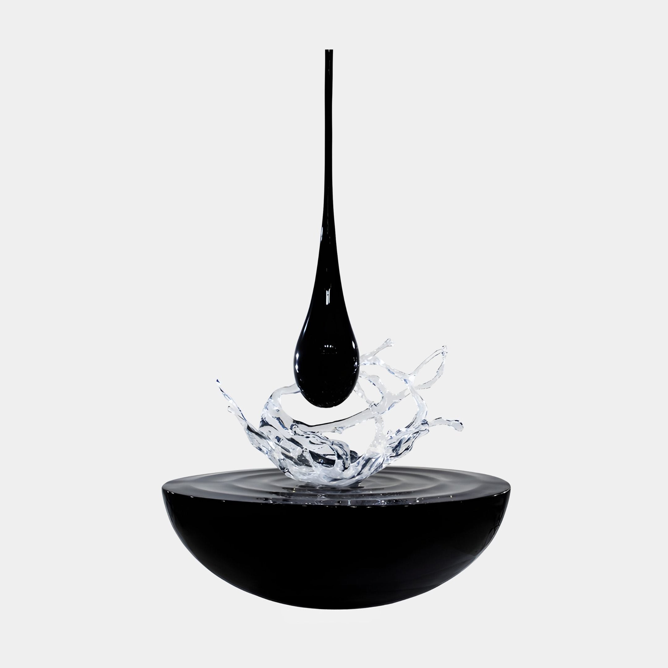 Glossy Black Hanging Teardrop Crown Splash Resin Sculpture by Giant Sculptures, showing a black droplet falling into a clear splash above a black bowl on a plain background.