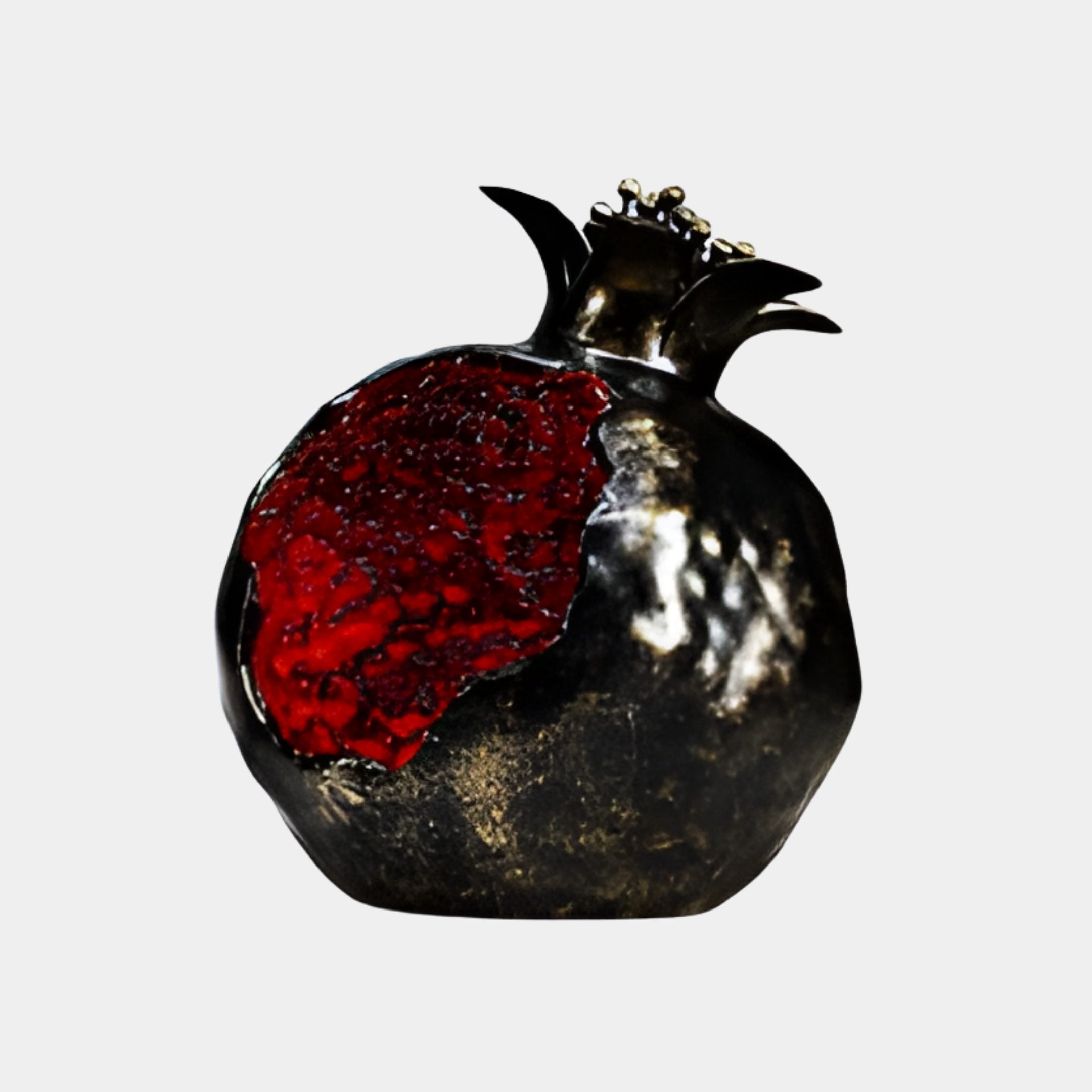 Dark Bronze & Red Seeded Pomegranate Sculpture by Giant Sculptures, 32cm, with a glossy metallic shell split open to reveal vivid red resin seeds.
