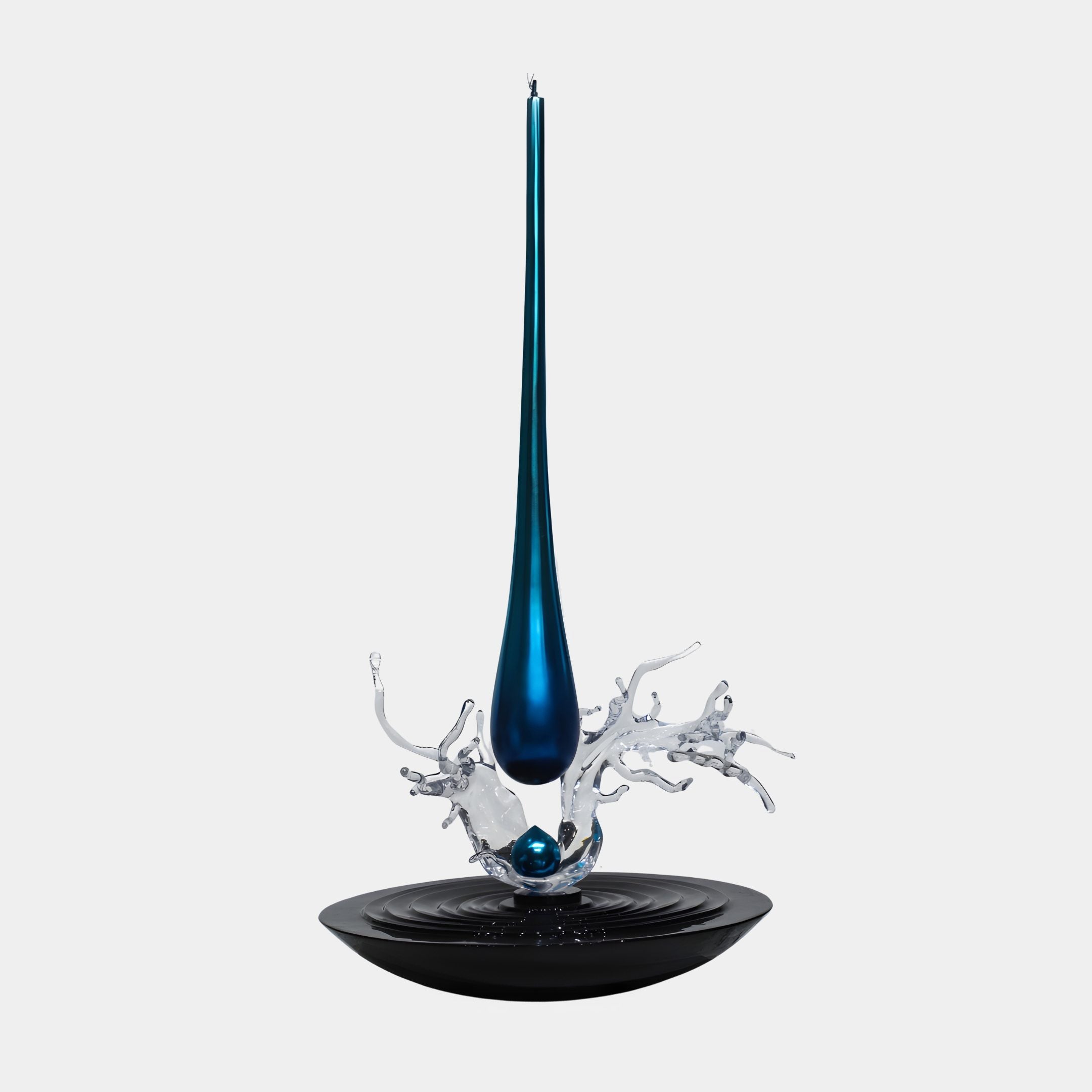 Metallic teal resin droplet suspended above a clear splash burst on a black bowl base, from Giant Sculptures' 183cm Floating Drop sculpture.