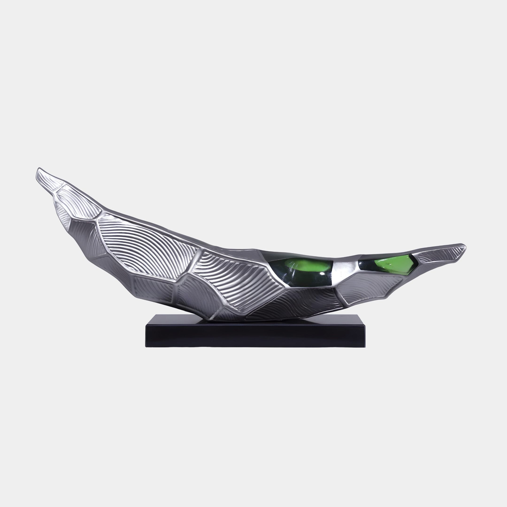 Giant Sculptures Green Inset Silver Abstract Boat Shaped Resin Sculpture in polished silver fibreglass with green resin insets on a black base.
