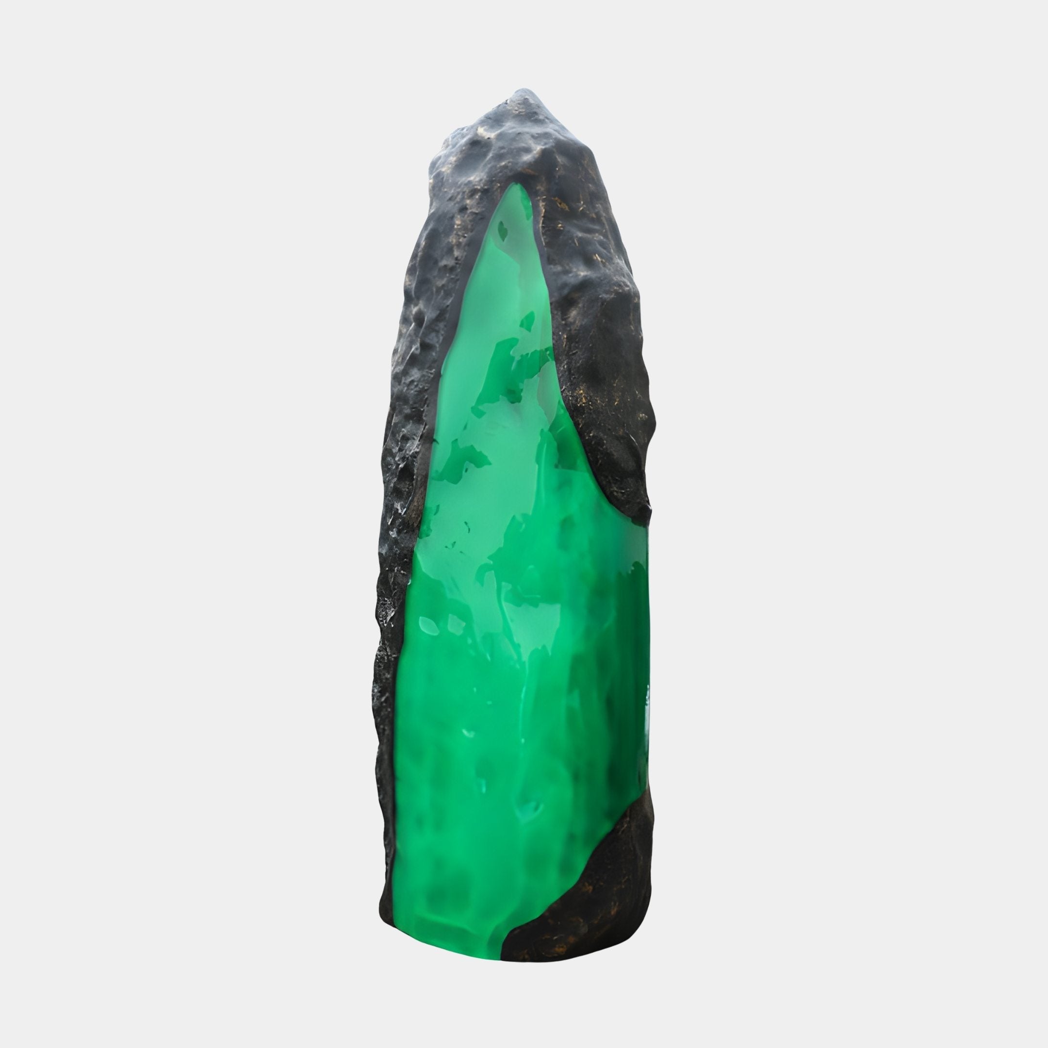 Giant Sculptures 270cm Green Resin Crystal Rock Column Sculpture with a rugged black fibreglass shell splitting open to reveal a glowing emerald resin core.