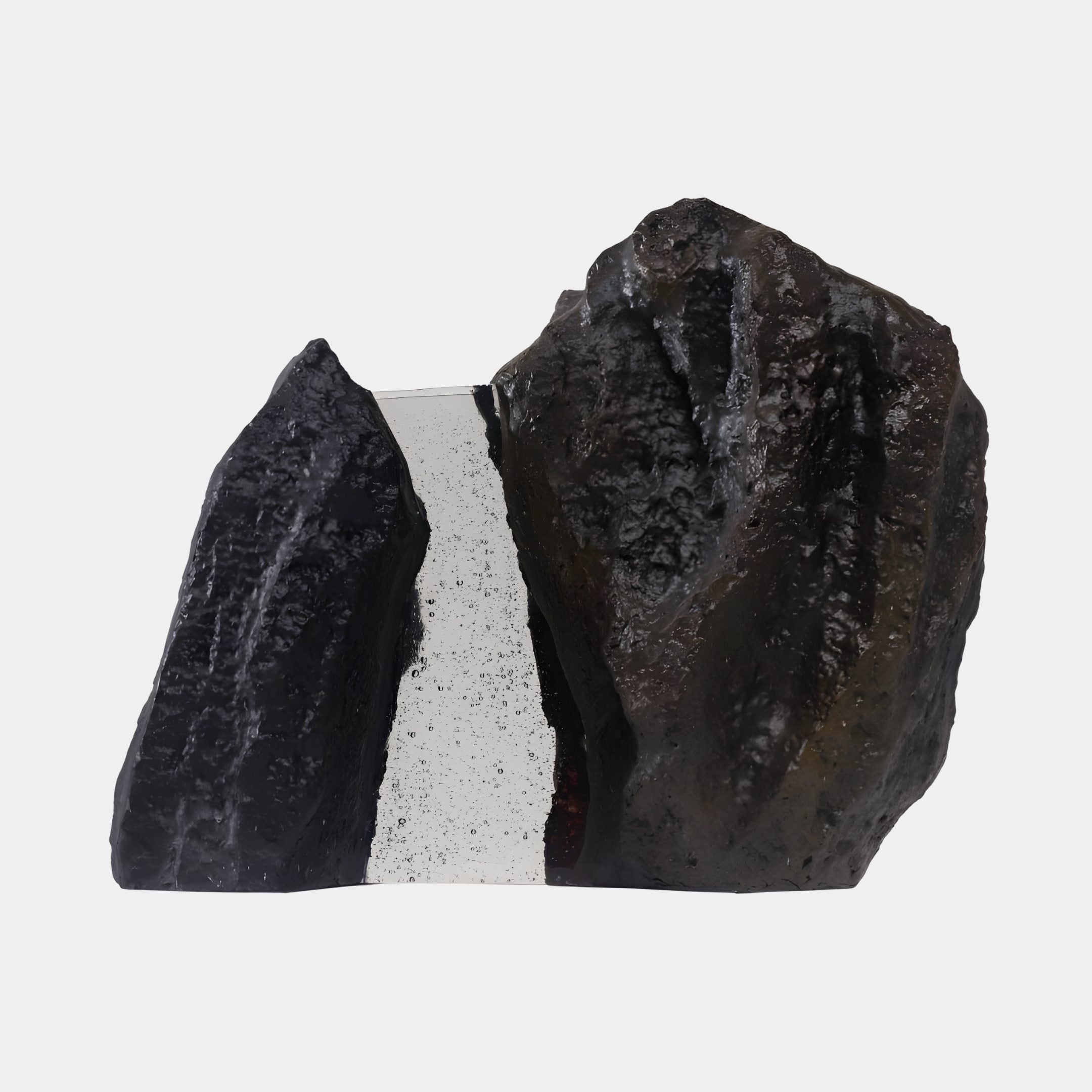 Giant Sculptures Clear Bubble Resin Inset on Black Rock Sculpture 60cm, two textured black fibreglass rock forms flanking a pale bubbled resin band, on white.