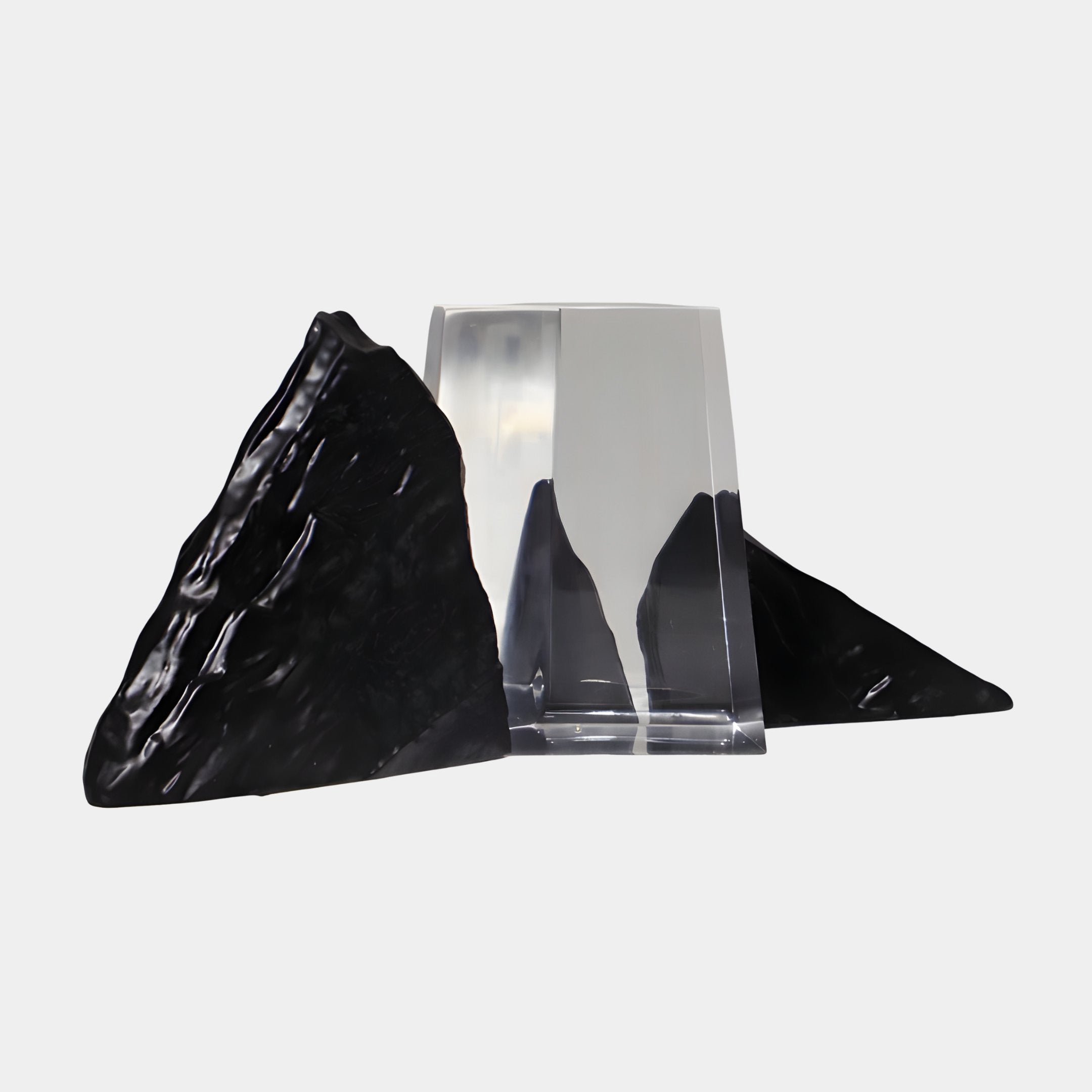Crystal Clear Resin & Black Geometric Peak Sculpture by Giant Sculptures, featuring a transparent engraved block flanked by two glossy black faceted peaks on a plain background.