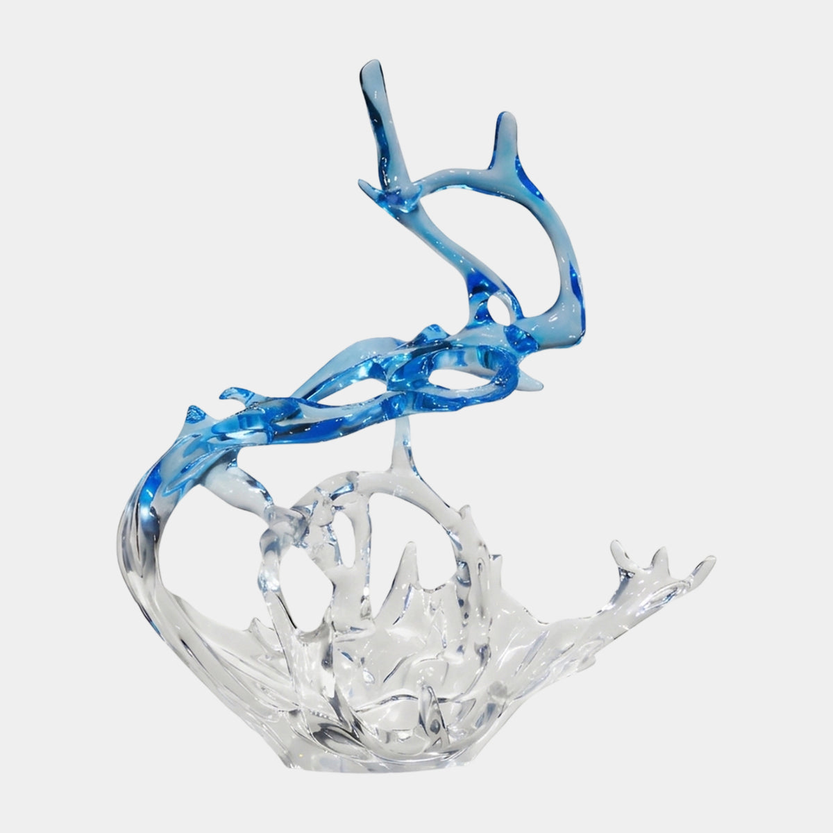 Clear & Blue-Topped Curling Splash Resin Sculpture, 81cm, with a colorless jagged basin and spray, topped by a twisted blue band and loop, shown on a plain white background.
