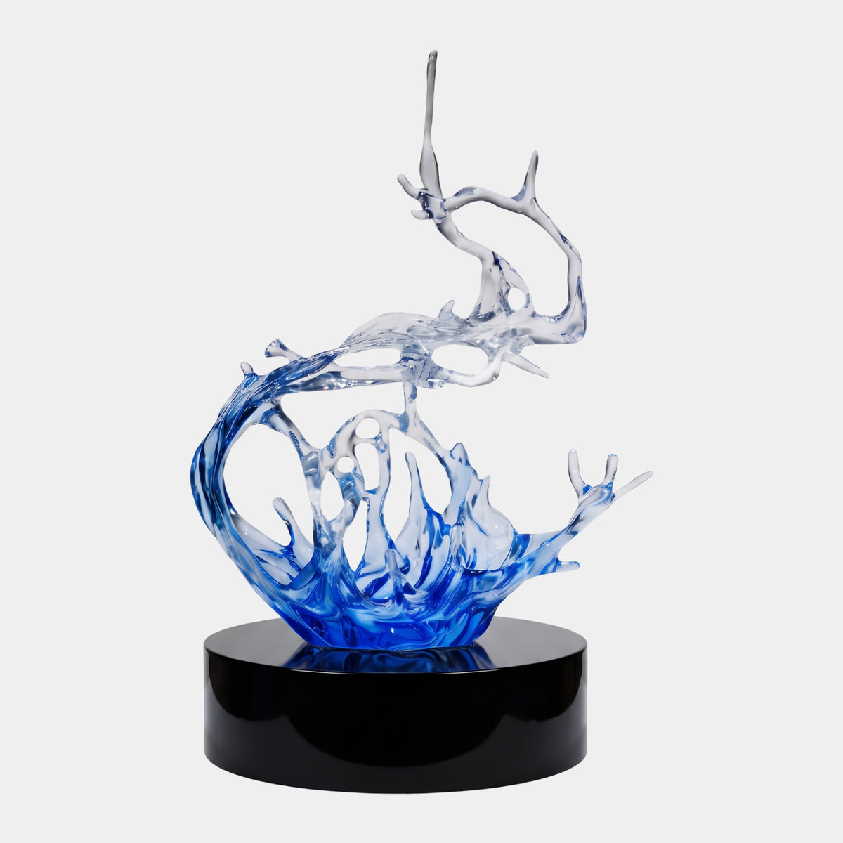 Blue Reaching Splash Cast Resin Sculpture, 144cm, wave-like resin form fading from blue to clear with branching arms, on a black round base against a white background.
