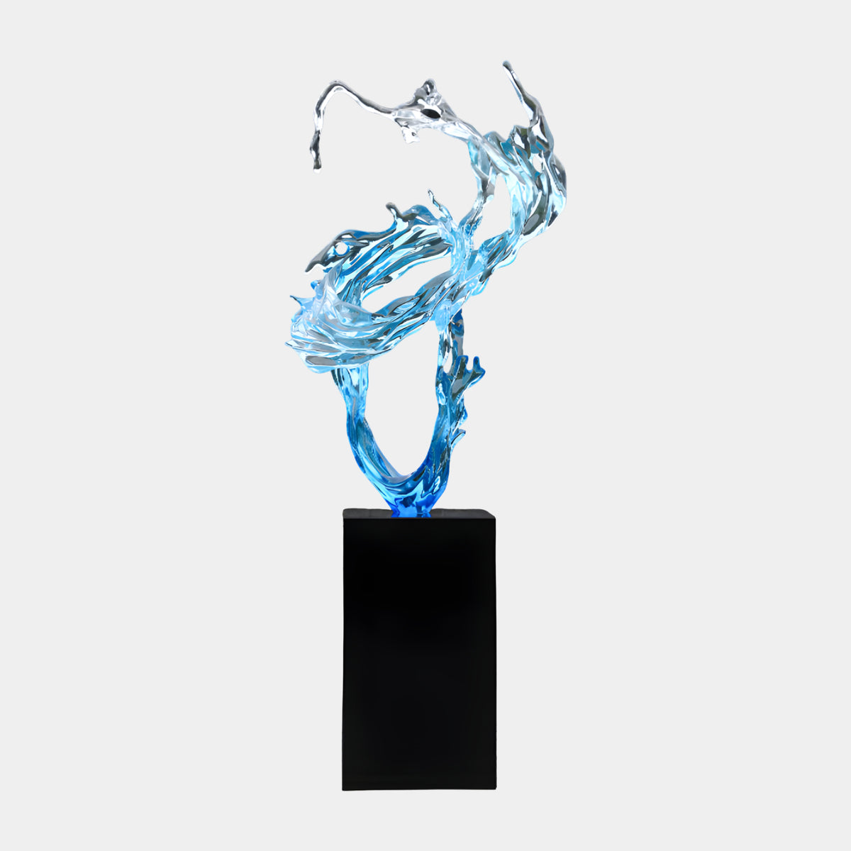 Blue & Clear Ribbon Swirl Wave on Plinth Resin Sculpture, 190cm, a swirling water-ribbon form on a tall black marble plinth, set against a plain light grey background.