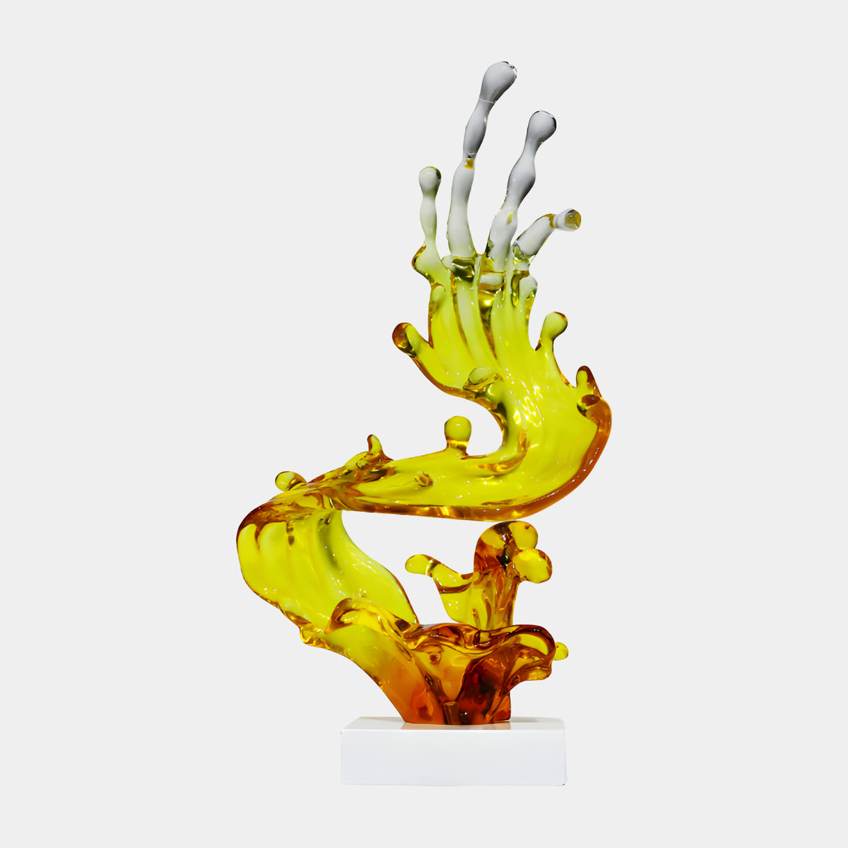 Yellow & Clear Curling Splash Resin Sculpture, 82cm, amber base rising into an S-curved yellow wave with clear fingertip droplets, on a white plinth against a plain light background.