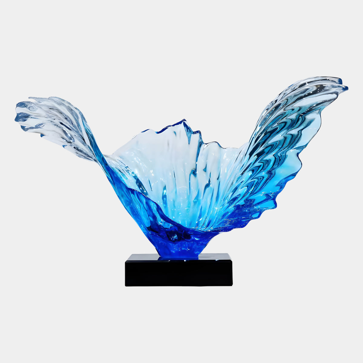 Cobalt Blue Ribbed Twin Wing Fan Resin Sculpture, 82cm, with azure wing tips rising from a pale cup on a black marble base, set against a plain white background.