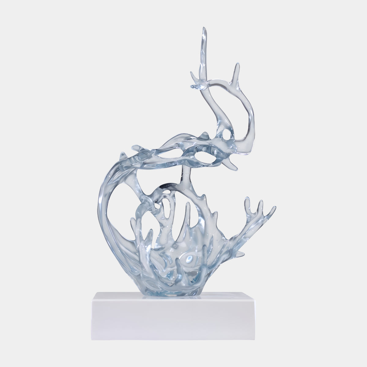 Clear Folded Arm Splash Cast Resin Sculpture, 51cm, wave-form with looping arm folding into points, on white base, plain light background.