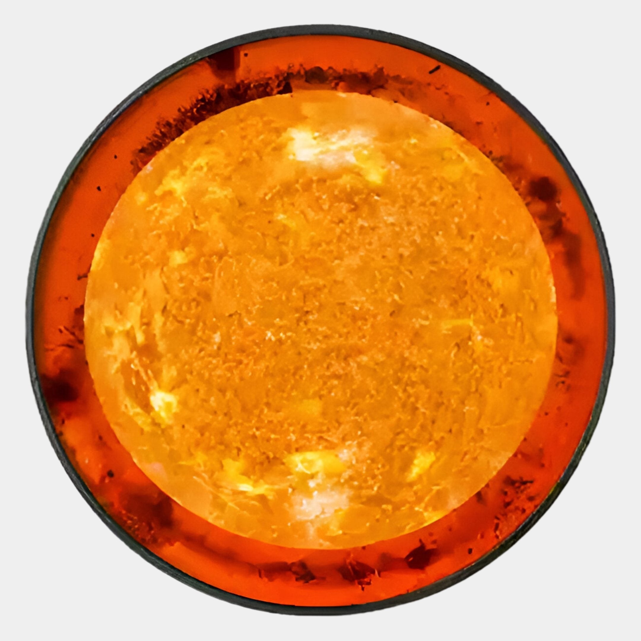 The Galaxia Sun Crystal Porcelain LED Wall Art by Giant Sculptures features a luminous orange and yellow sun-like circle with a textured surface and dark rim, radiating brilliance against a light gray background.