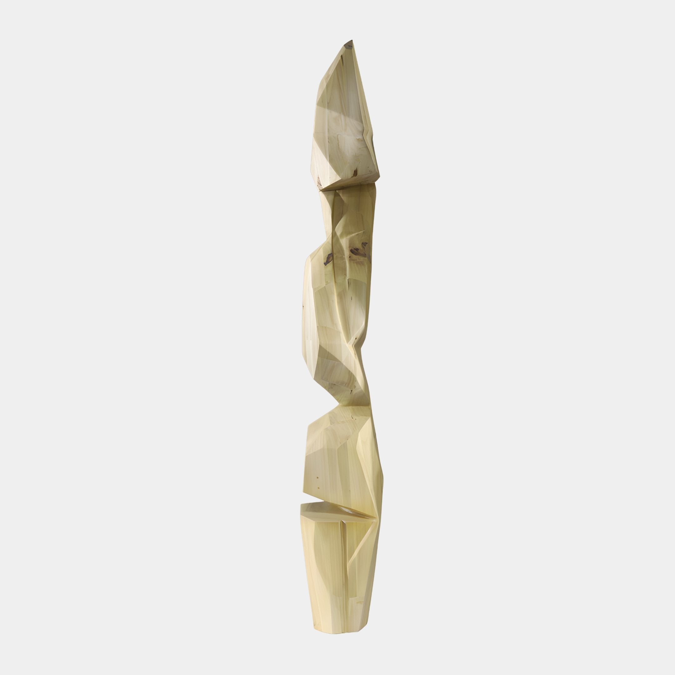 Natural Wood Faceted Totem Sculpture 185cm by Giant Sculptures, a tall vertical stack of angular pale wood crystalline blocks zigzagging upward against a white background.