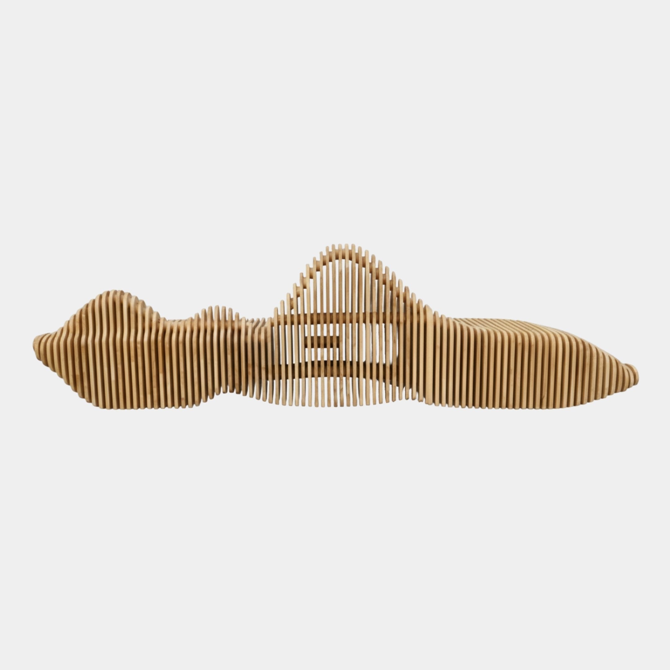 Side view of the Giant Sculptures Reclining Slatted Wood Sculpture at 350cm, honey-toned vertical slats forming a reclining figure silhouette on a plain background.