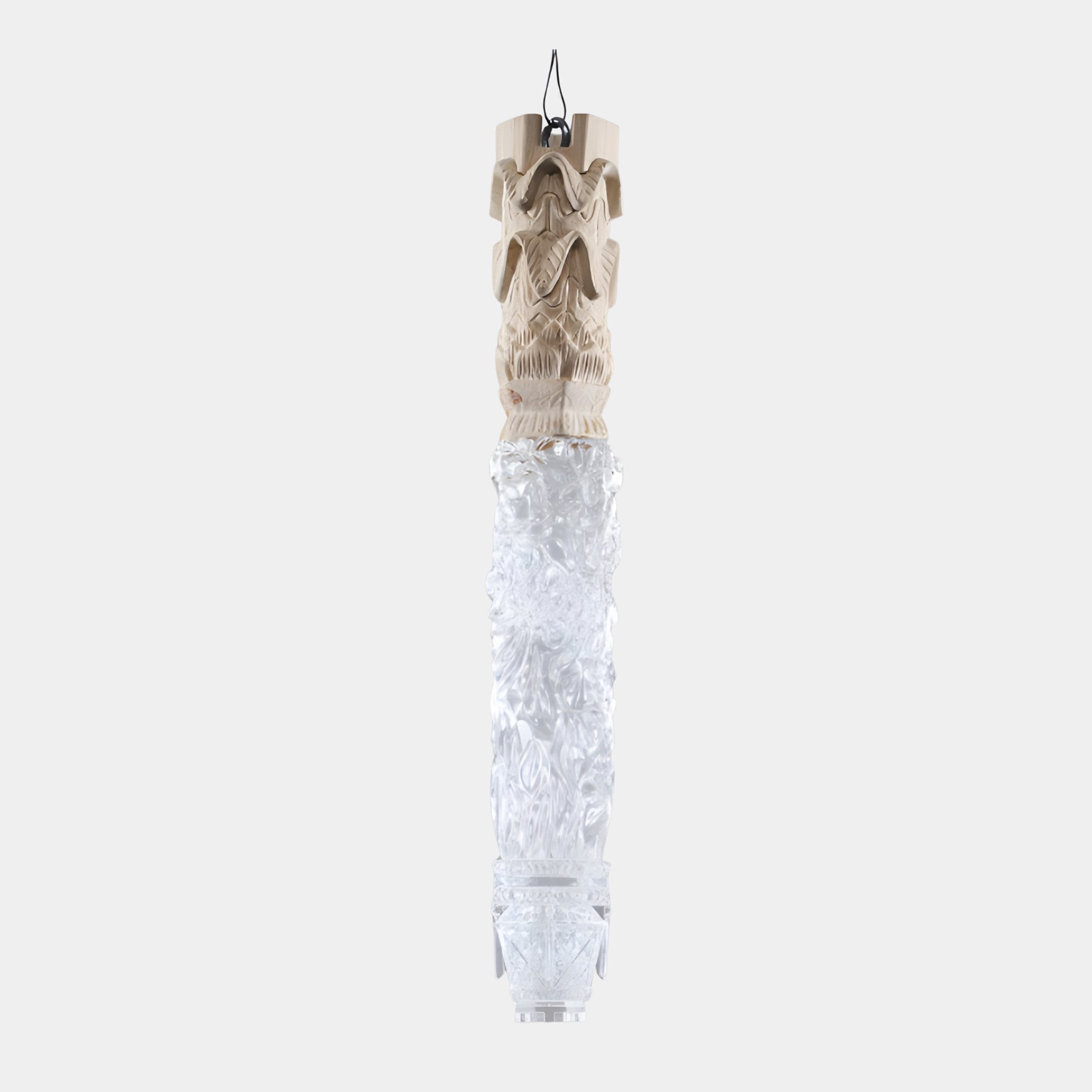 Giant Sculptures Hanging Carved Wood & Clear Resin Column 45cm with a pale carved wood capital above a textured clear resin body, suspended on a wire against a plain background.