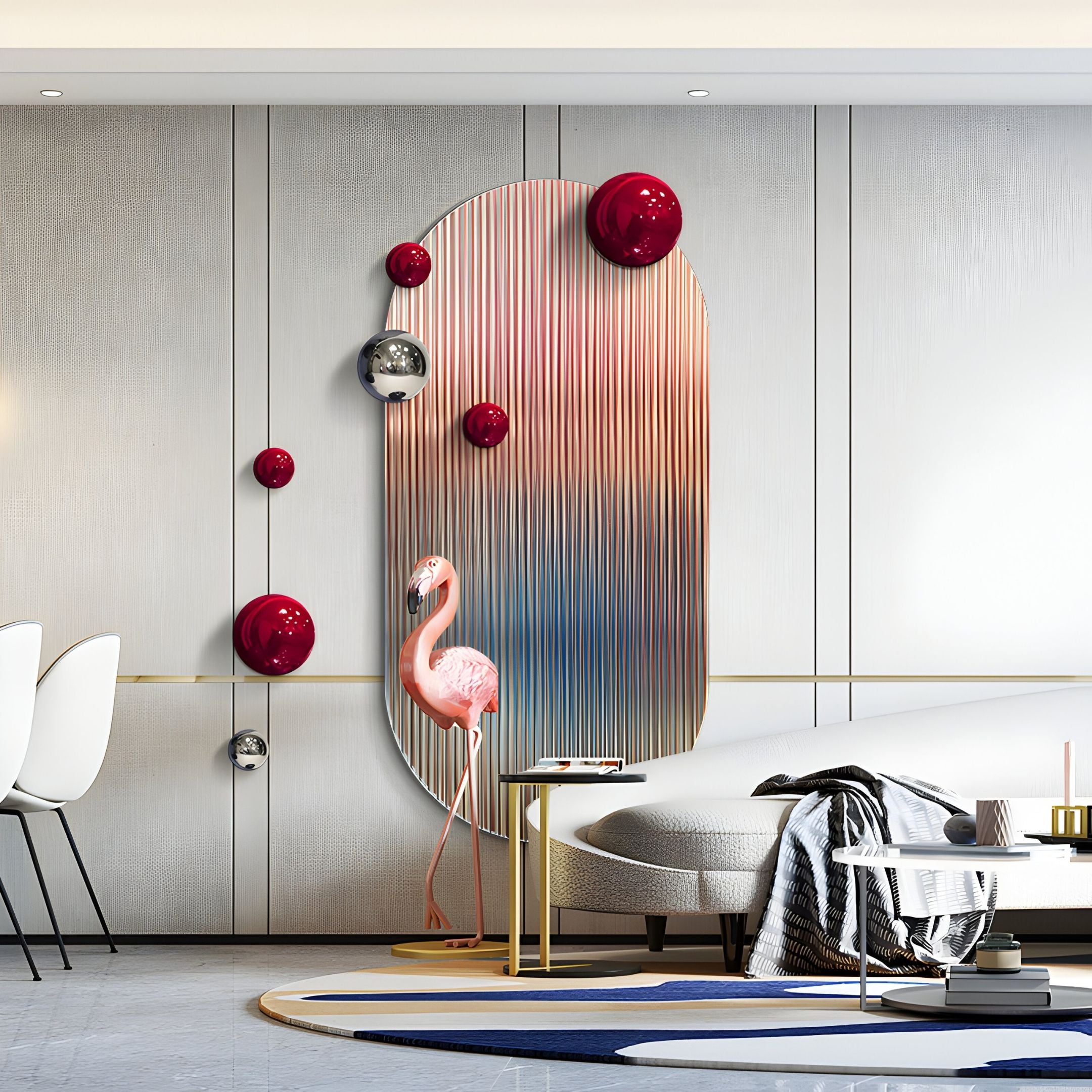 A modern living room features the Giant Sculptures Virellon Rose Gradient 3D Wall Art with red & silver metal balls, paired with a pink flamingo sculpture, white chairs, tables, and a cozy blanket for a stylish touch.