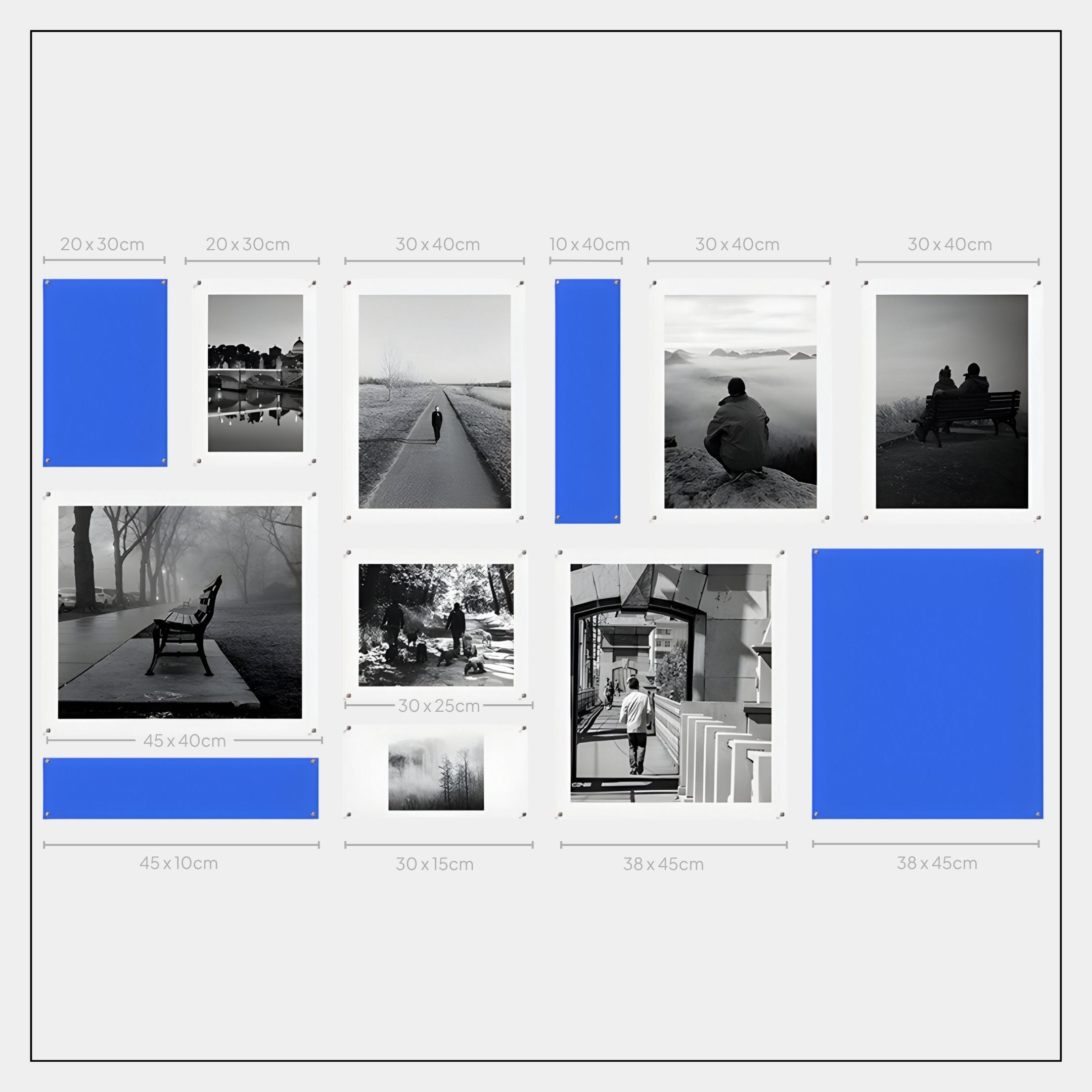The Framegrid Blue Mixed-Size Gallery 12-Set Acrylic Wall Art by Giant Sculptures features 12 labeled frames in various sizes, some with black-and-white photos and five with solid blue—ideal for contemporary spaces.