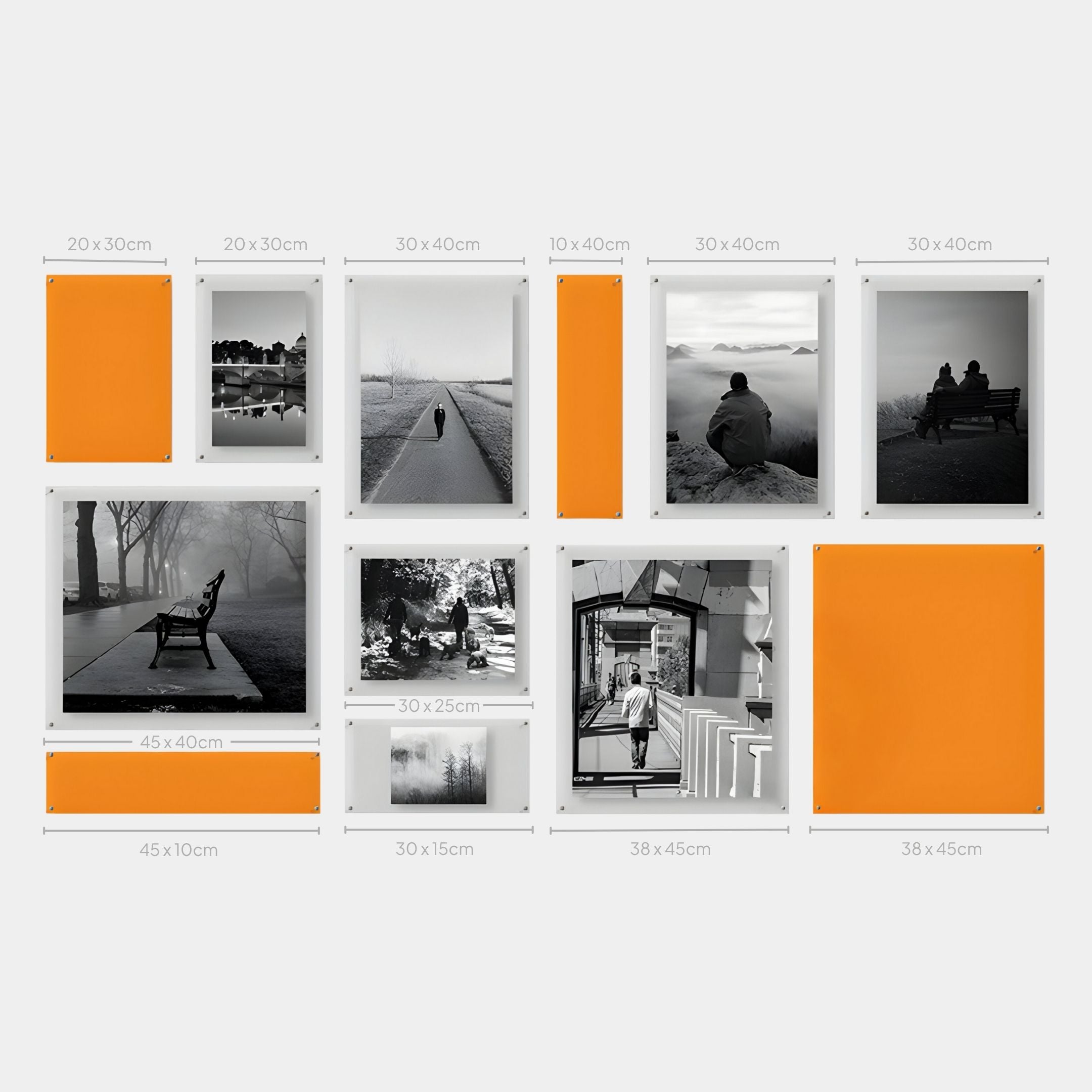 The Framegrid Orange Mixed-Size Gallery 12-Set Acrylic Wall Art by Giant Sculptures features a modern grid of twelve framed pieces—photos and orange accents—arranged on a light background for stylish home decor.
