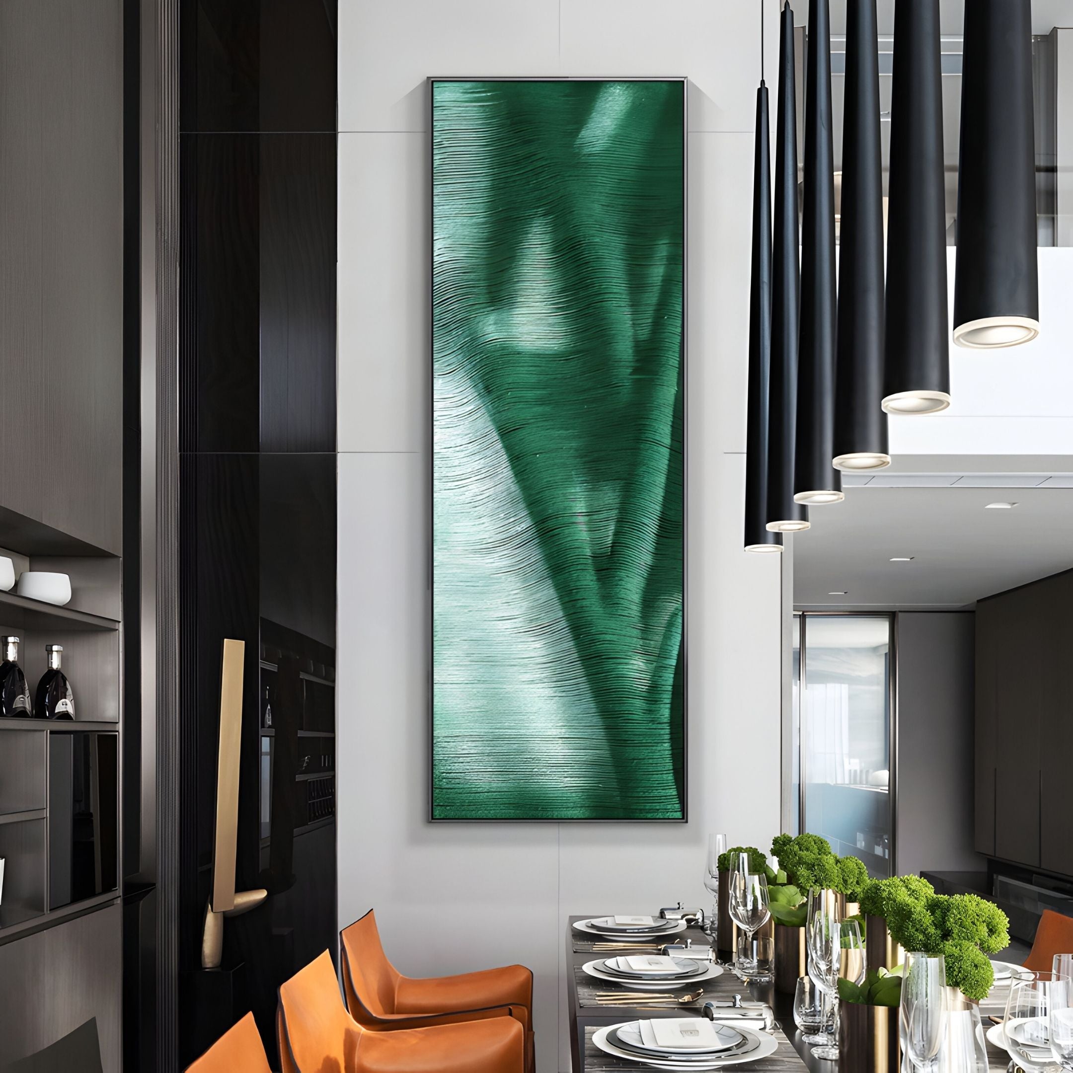 A modern dining room features tan leather chairs, a set dining table, black pendant lights, and Giant Sculptures' Rivara Emerald Wave Vertical Hand-Painted Rope 3D Wall Art. Green floral centerpieces add to the chic contemporary decor.