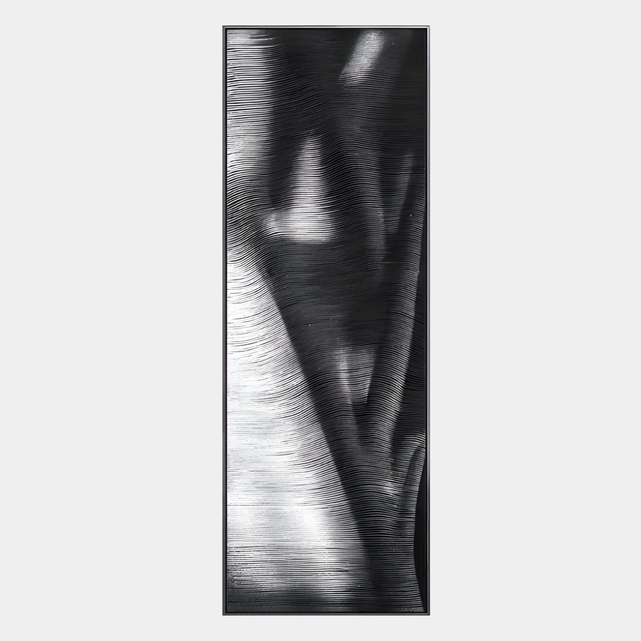 The Rivara Obsidian Wave Vertical Hand-Painted Rope 3D Wall Art by Giant Sculptures features textured black and white waves within a rectangular frame, creating dynamic light and shadow—ideal for modern sculptural interiors.