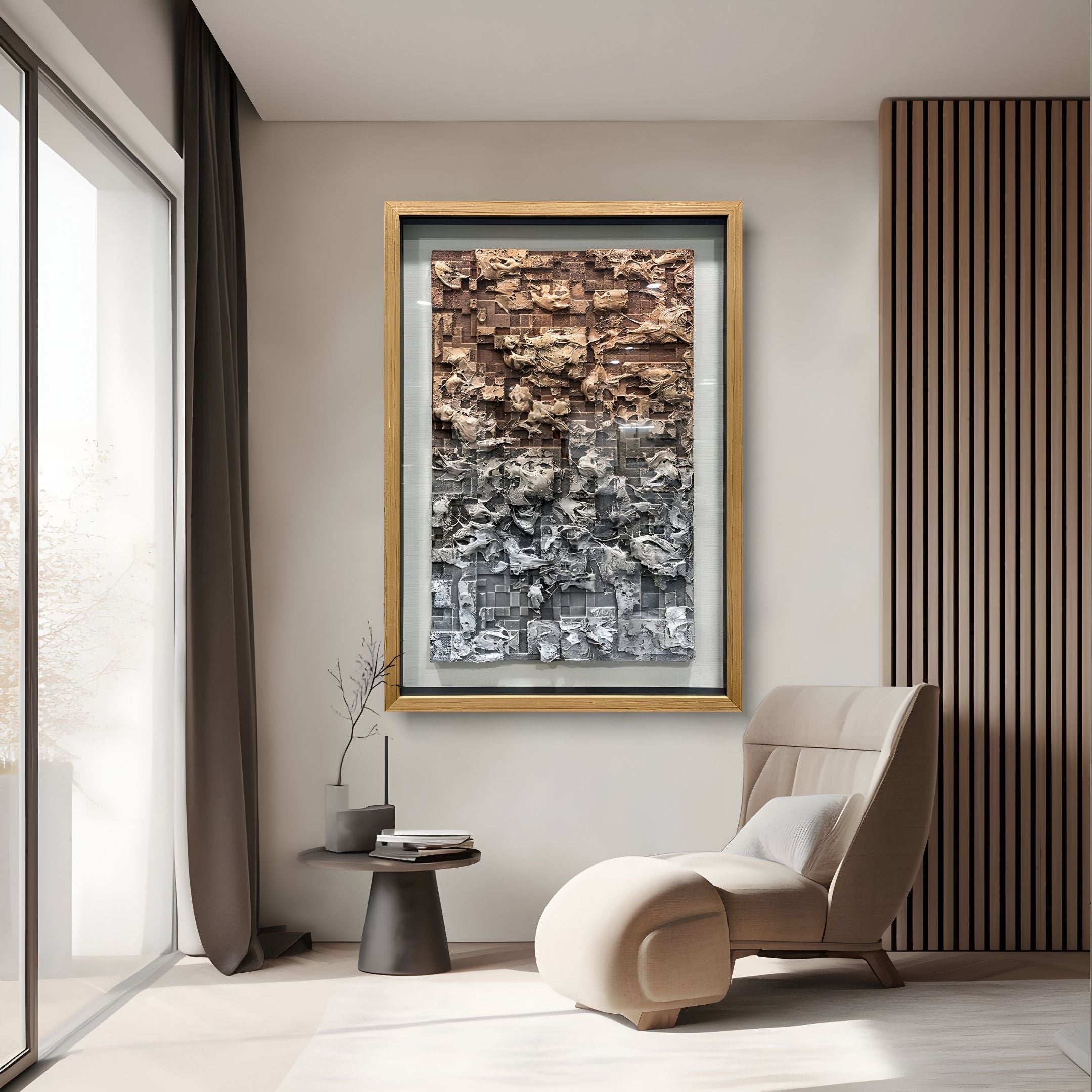 A modern living room with a beige lounge chair, black side table, floor vase, and Terracend Beige & Grey Textured Wood Framed 3D Wall Art by Giant Sculptures. Light from tall glass doors highlights the stylish wall decor.